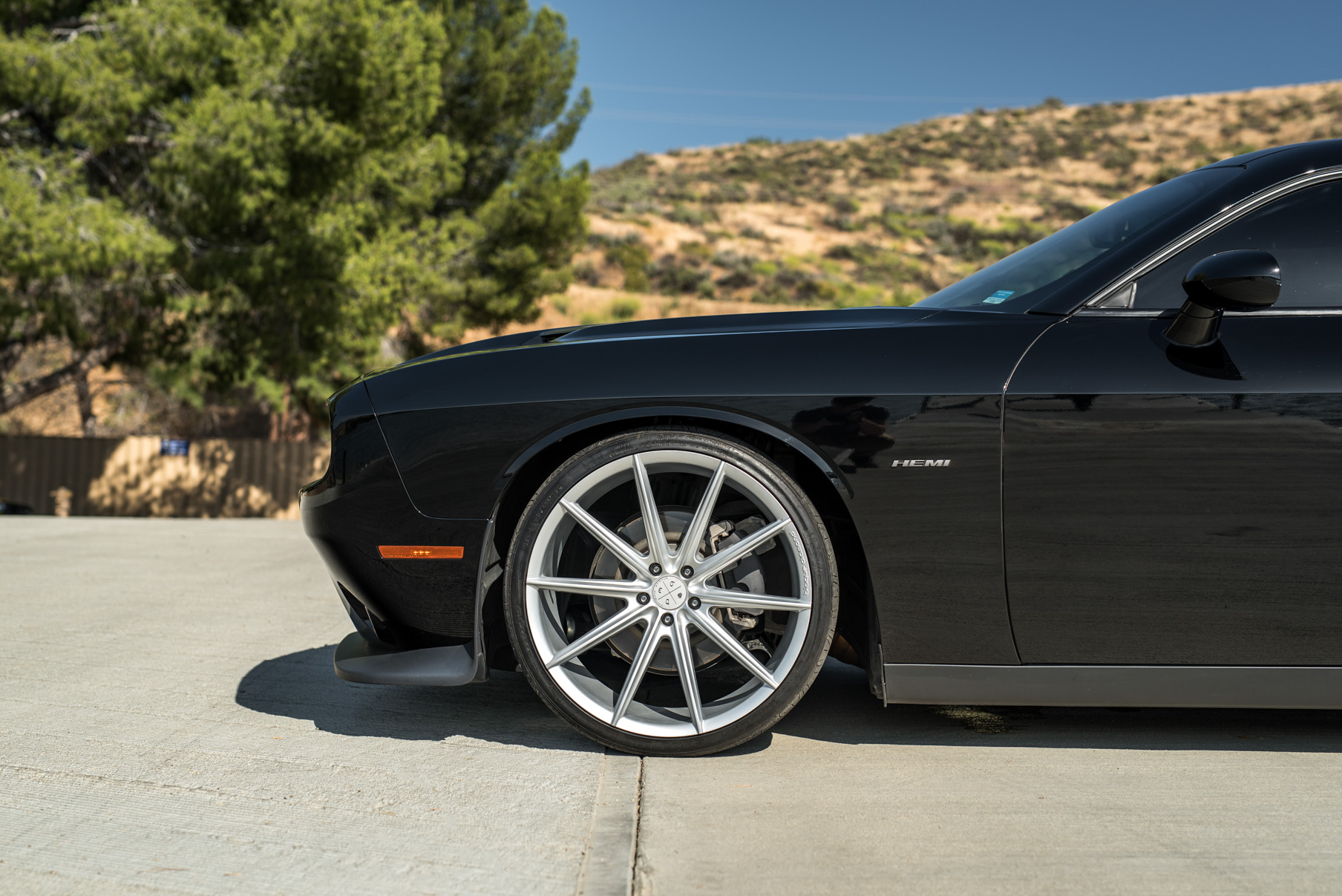 A 2016 Dodge Charger SRT on 22 Inch Blaque Diamond BD-11 Frozen Silver Wheels