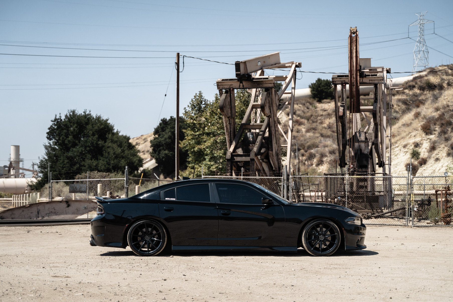 A 2018 Dodge Charger on 20 Inch Blaque Diamond BD-11 Gloss Black Wheels