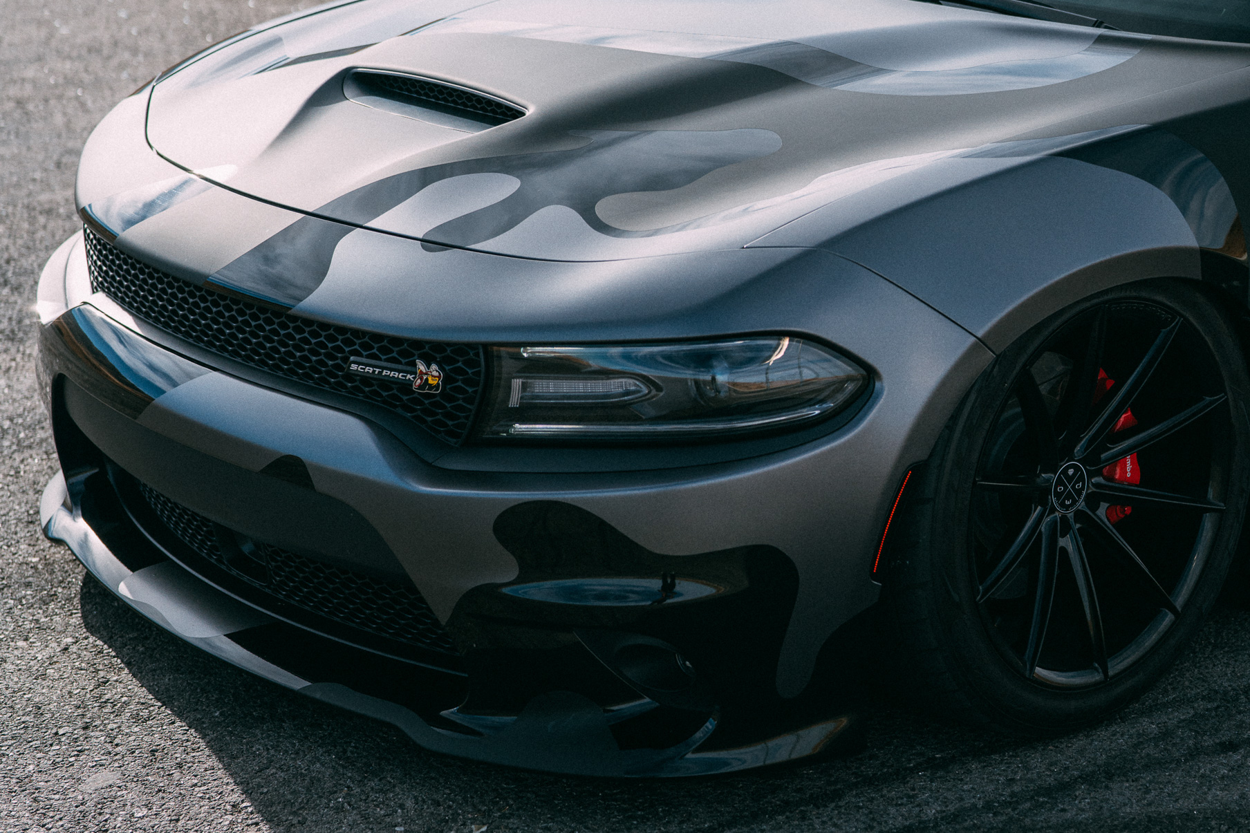 A 2016 Dodge Charger Scat Pack on 20 Inch Blaque Diamond BD-11 Gloss Black Wheels