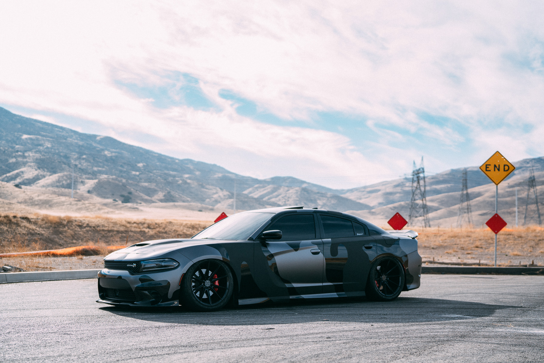 A 2016 Dodge Charger Scat Pack on 20 Inch Blaque Diamond BD-11 Gloss Black Wheels