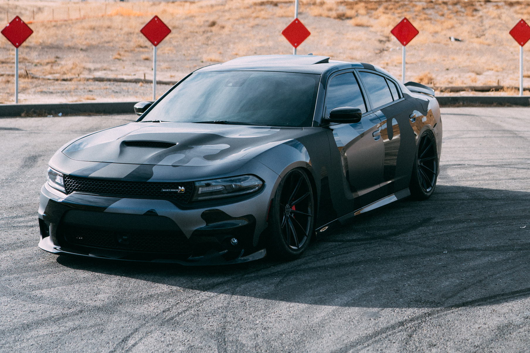 A 2016 Dodge Charger Scat Pack on 20 Inch Blaque Diamond BD-11 Gloss Black Wheels