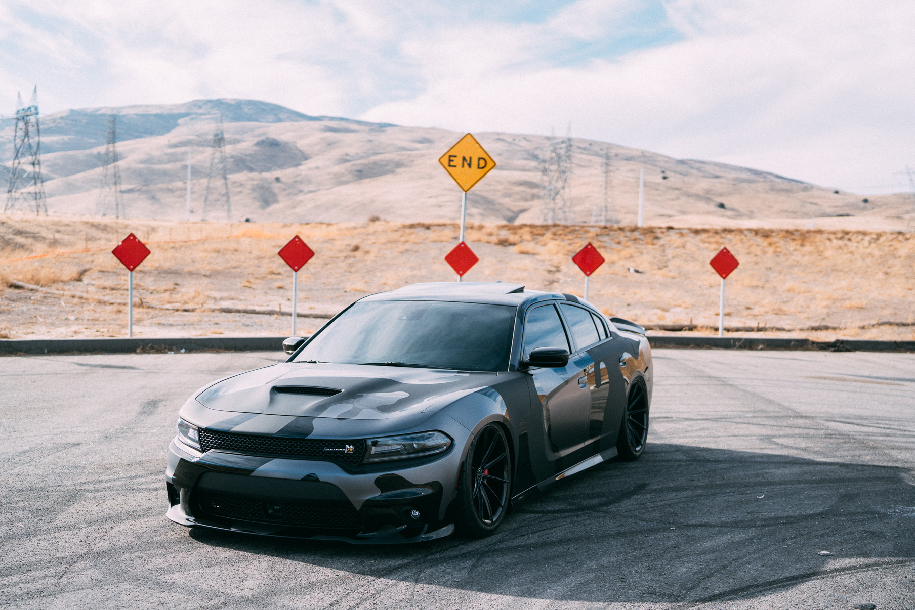 A 2016 Dodge Charger Scat Pack on 20 Inch Blaque Diamond BD-11 Gloss Black Wheels