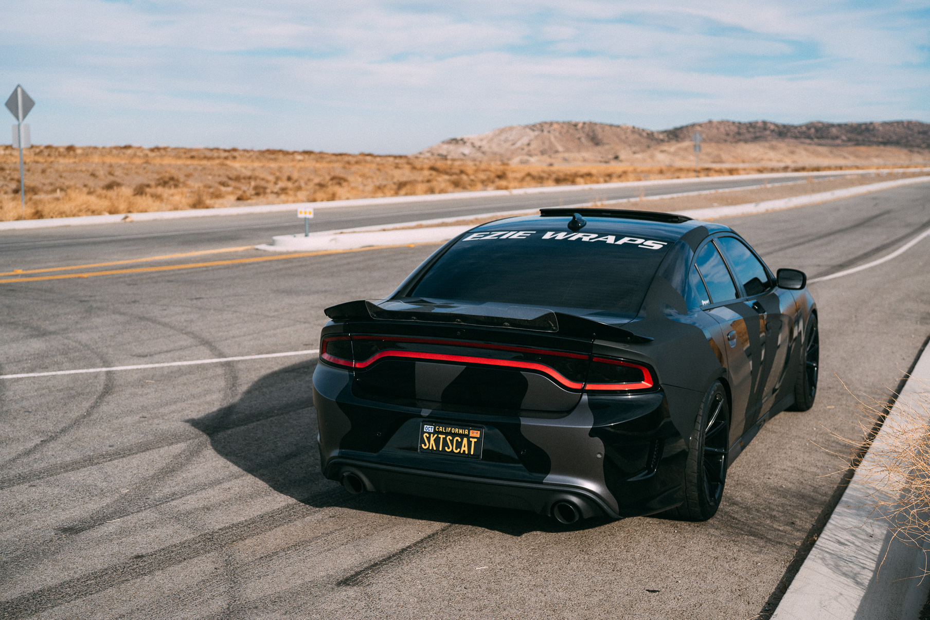 A 2016 Dodge Charger Scat Pack on 20 Inch Blaque Diamond BD-11 Gloss Black Wheels