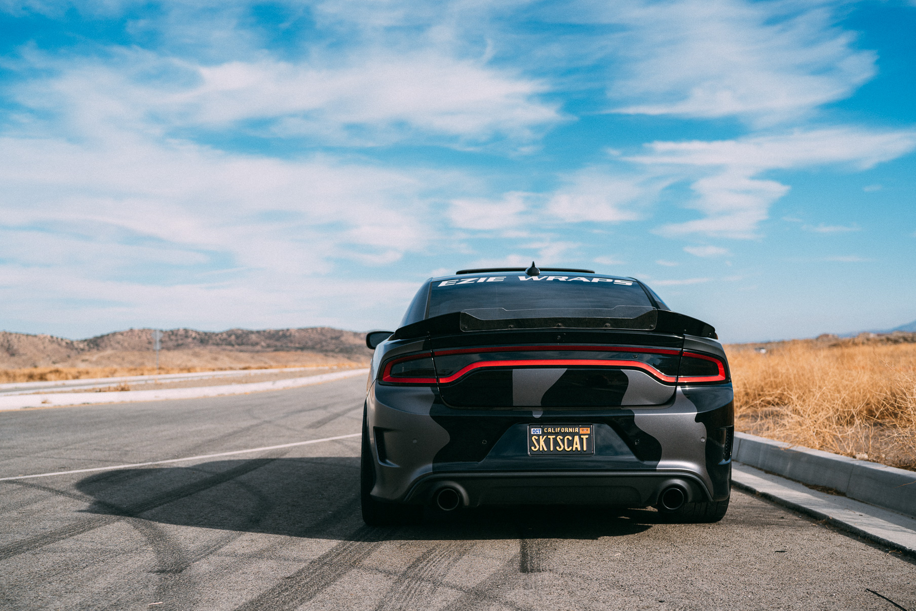A 2016 Dodge Charger Scat Pack on 20 Inch Blaque Diamond BD-11 Gloss Black Wheels