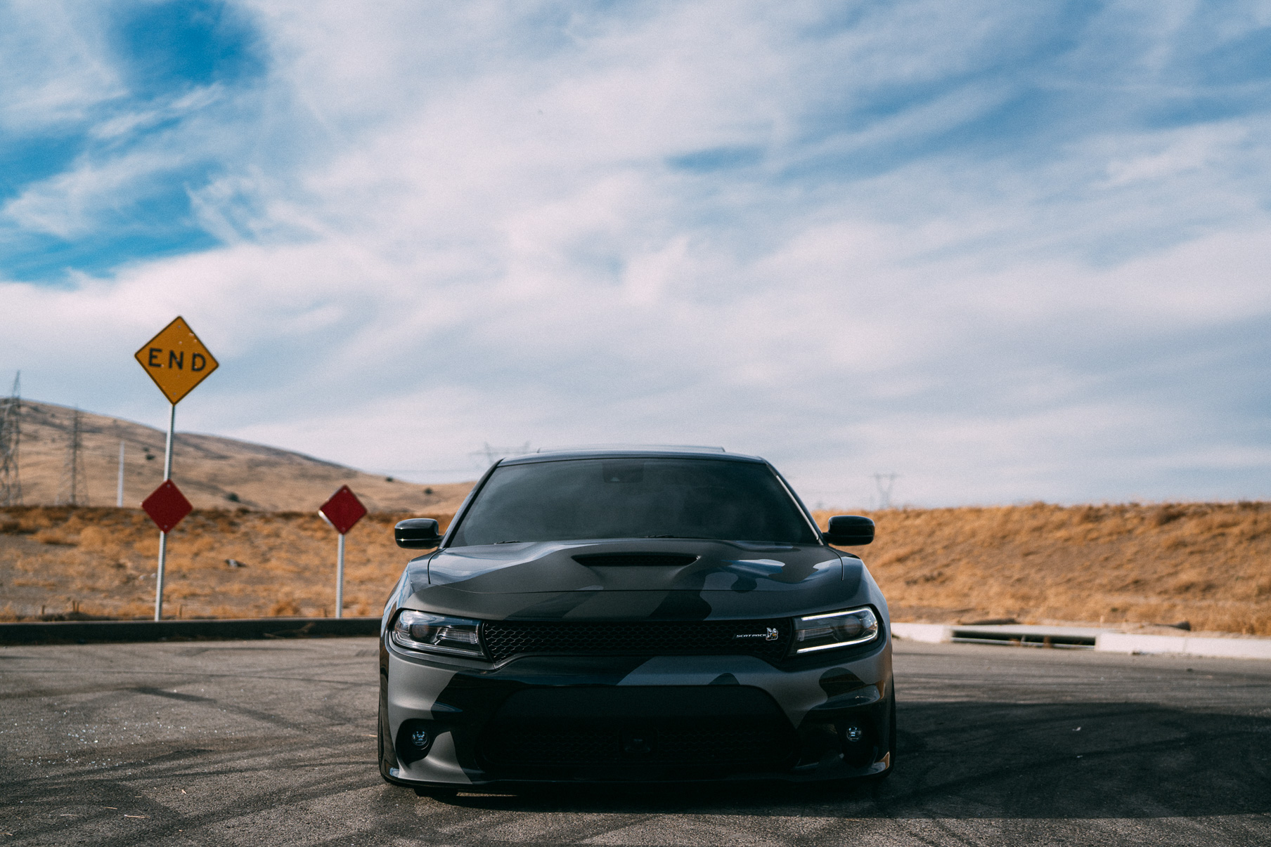 A 2016 Dodge Charger Scat Pack on 20 Inch Blaque Diamond BD-11 Gloss Black Wheels