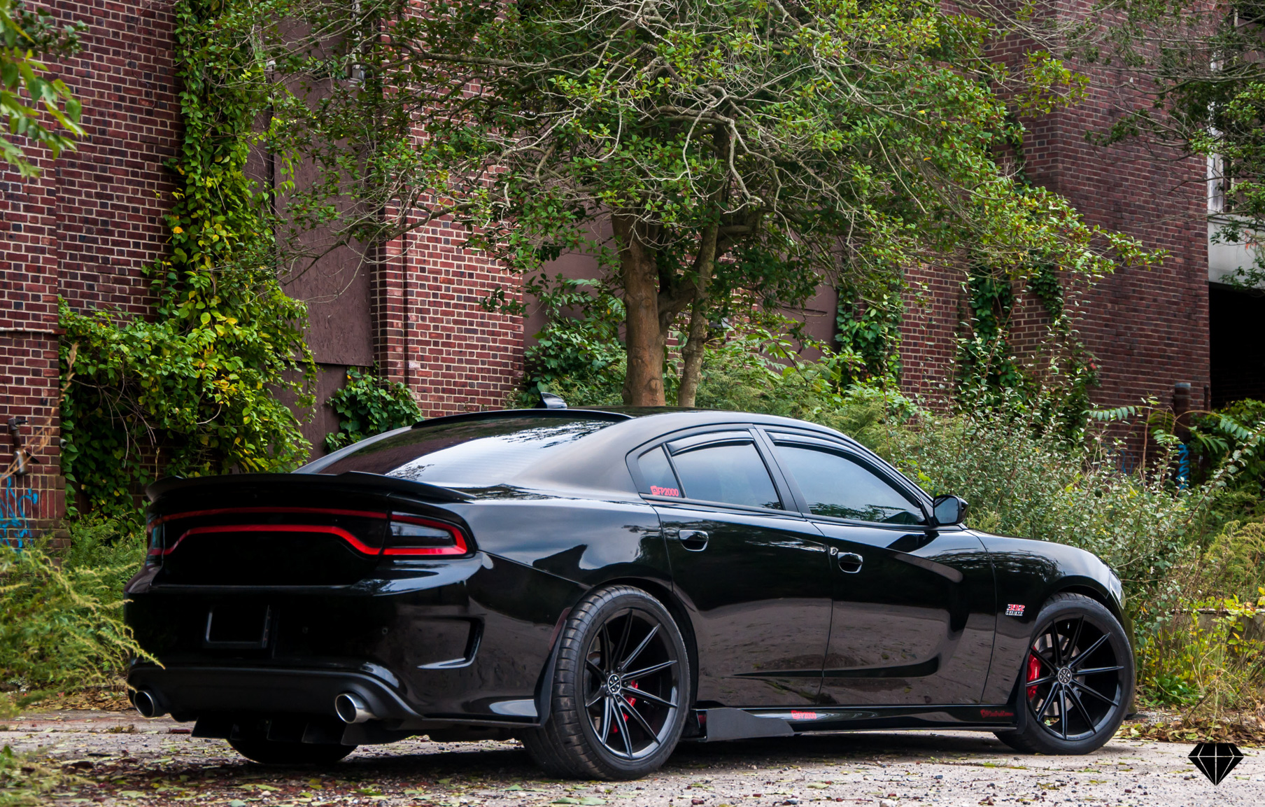 A 2016 Dodge Charger Scat Pack on 20 Inch Blaque Diamond BD-11 Gloss Black Wheels