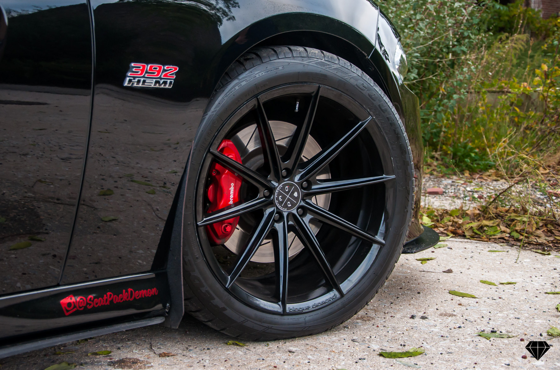A 2016 Dodge Charger Scat Pack on 20 Inch Blaque Diamond BD-11 Gloss Black Wheels