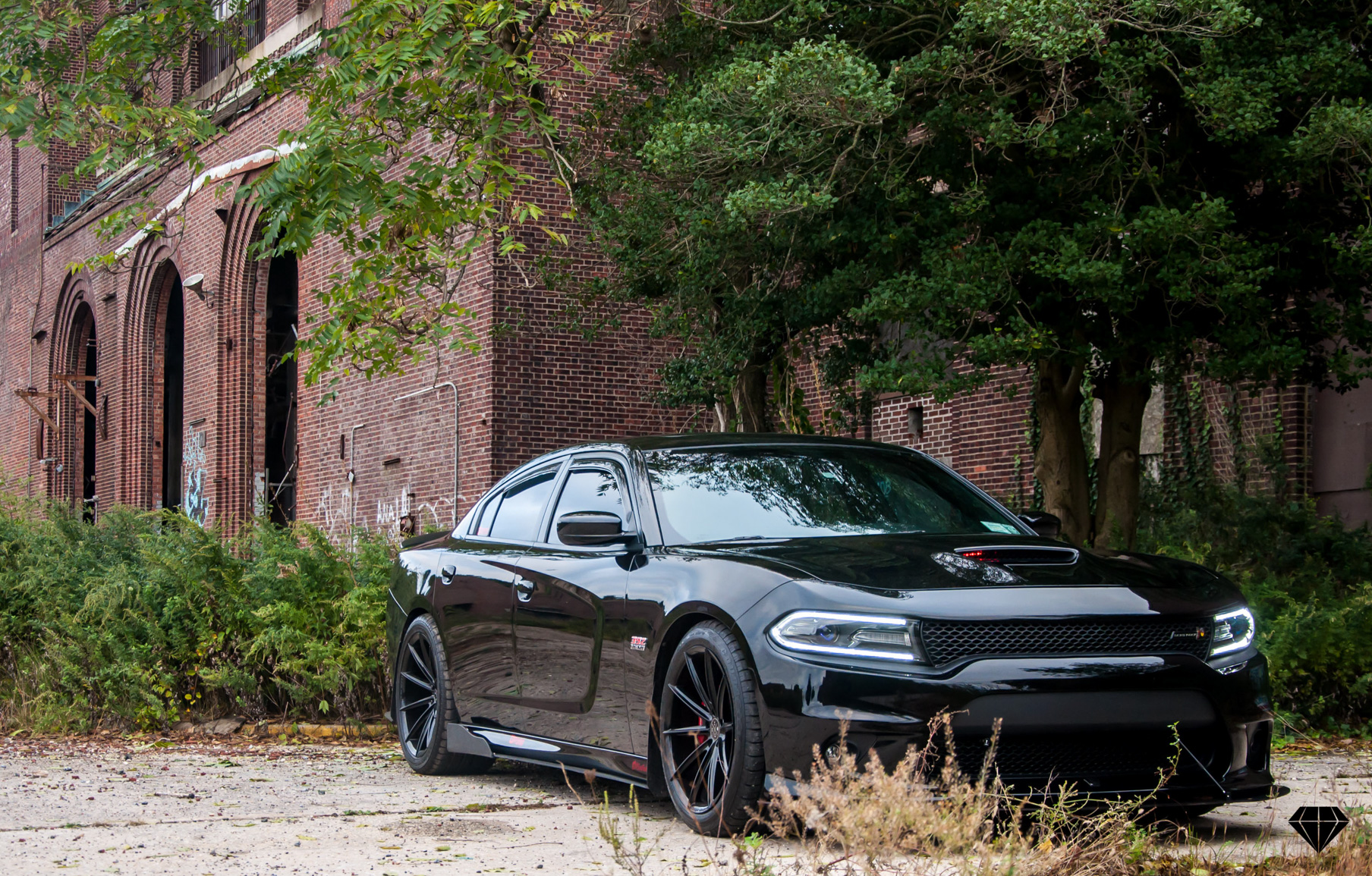 A 2016 Dodge Charger Scat Pack on 20 Inch Blaque Diamond BD-11 Gloss Black Wheels