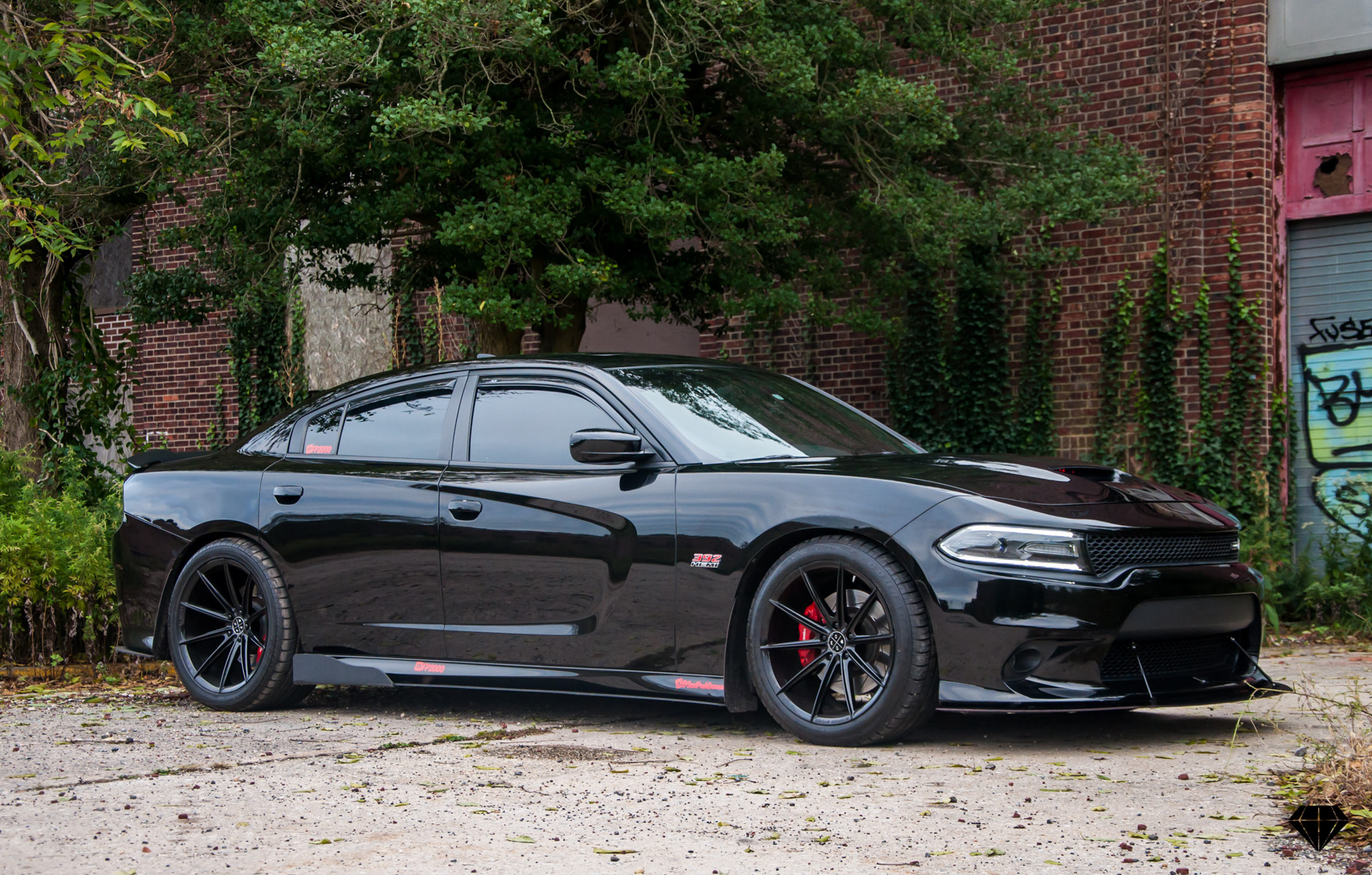 A 2016 Dodge Charger Scat Pack on 20 Inch Blaque Diamond BD-11 Gloss Black Wheels