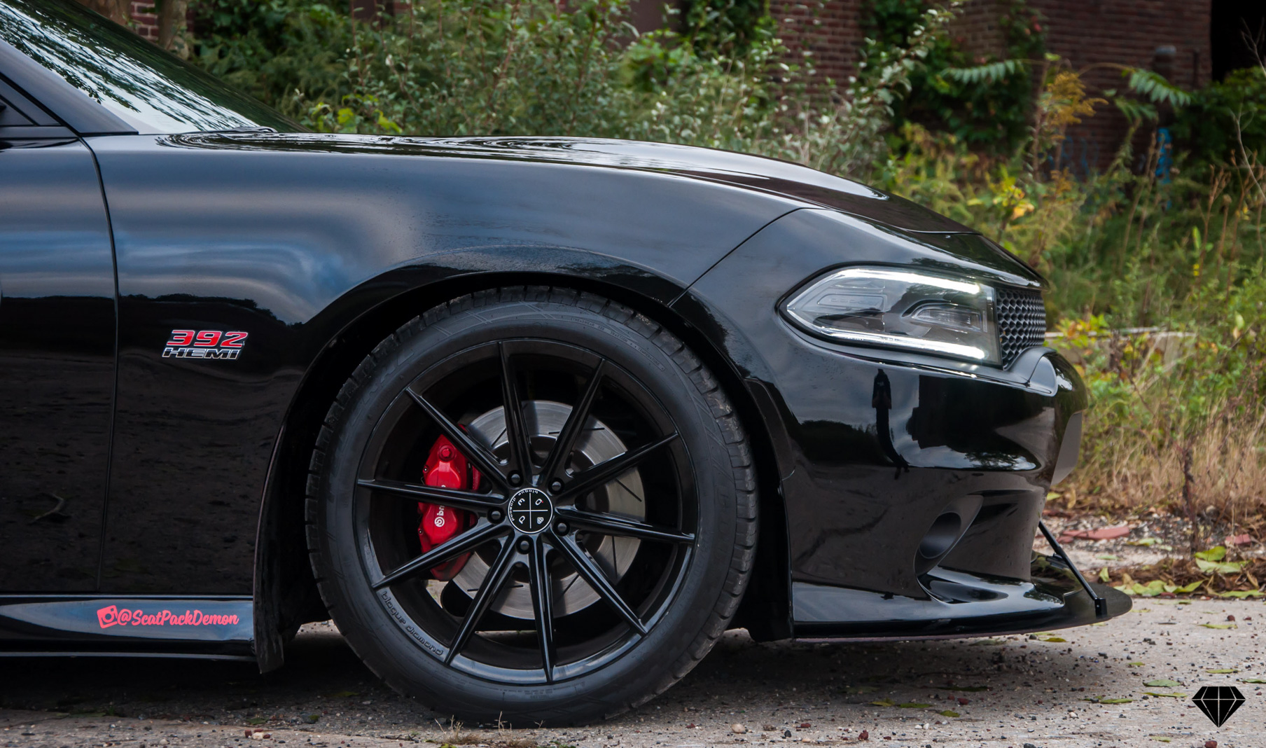 A 2016 Dodge Charger Scat Pack on 20 Inch Blaque Diamond BD-11 Gloss Black Wheels