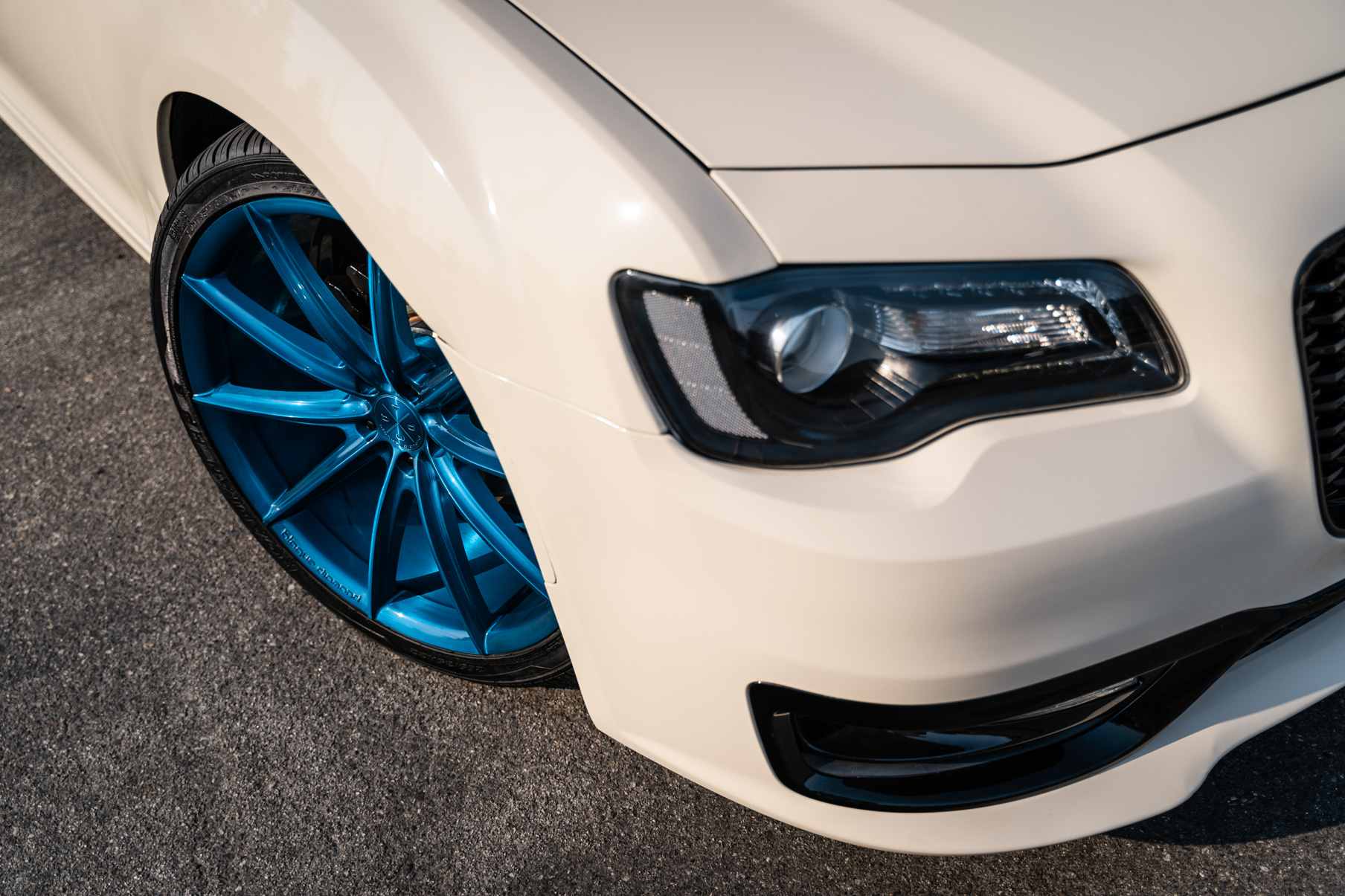 A 2018 Chrysler 300 on 22 Inch Blaque Diamond BD-11 Brushed Blue Wheels