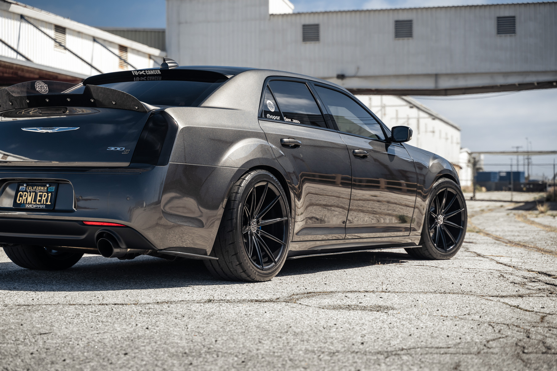 A 2016 Chrysler 300 S on Blaque Diamond BD-11 Gloss Black Wheels