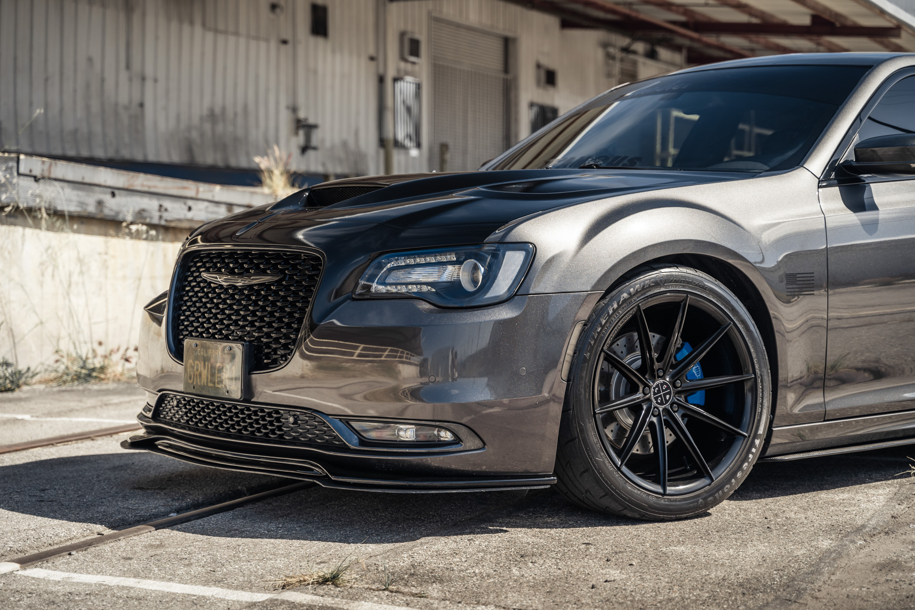 A 2016 Chrysler 300 S on Blaque Diamond BD-11 Gloss Black Wheels