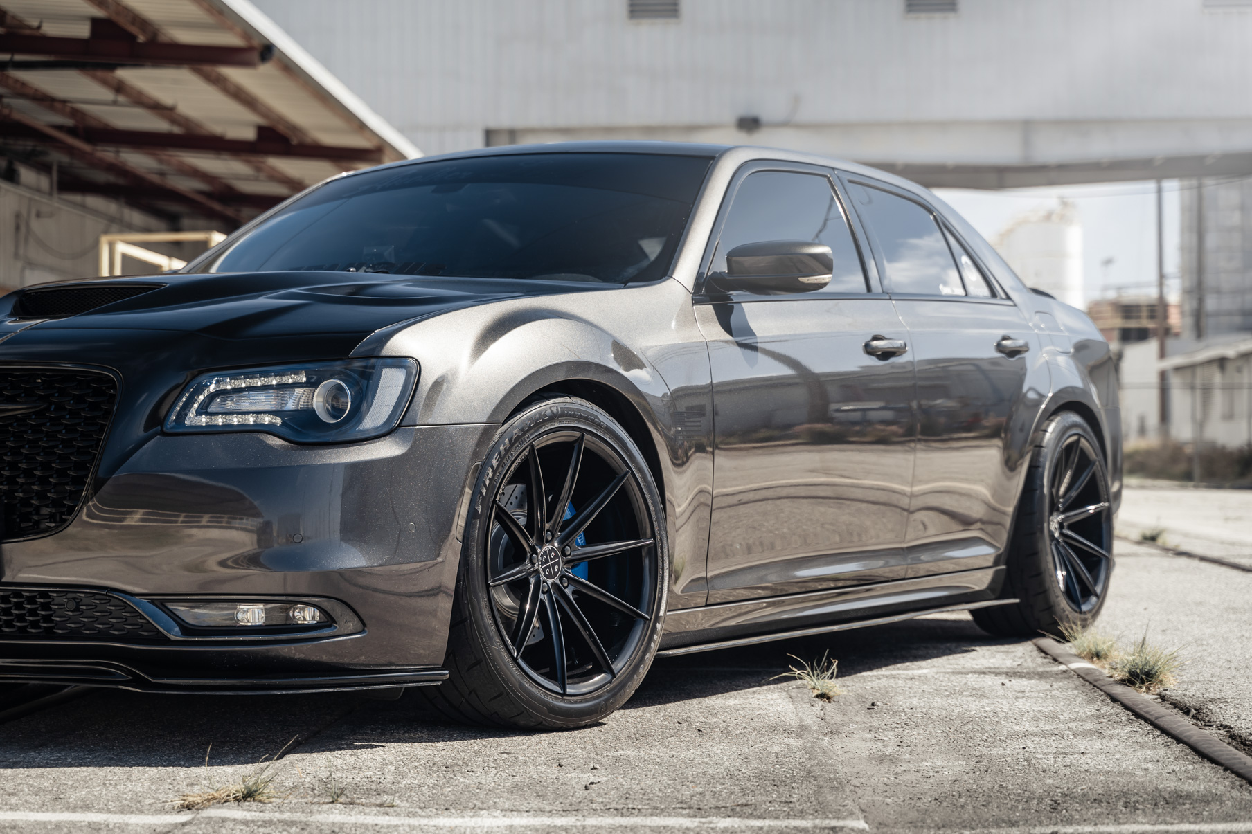 A 2016 Chrysler 300 S on Blaque Diamond BD-11 Gloss Black Wheels