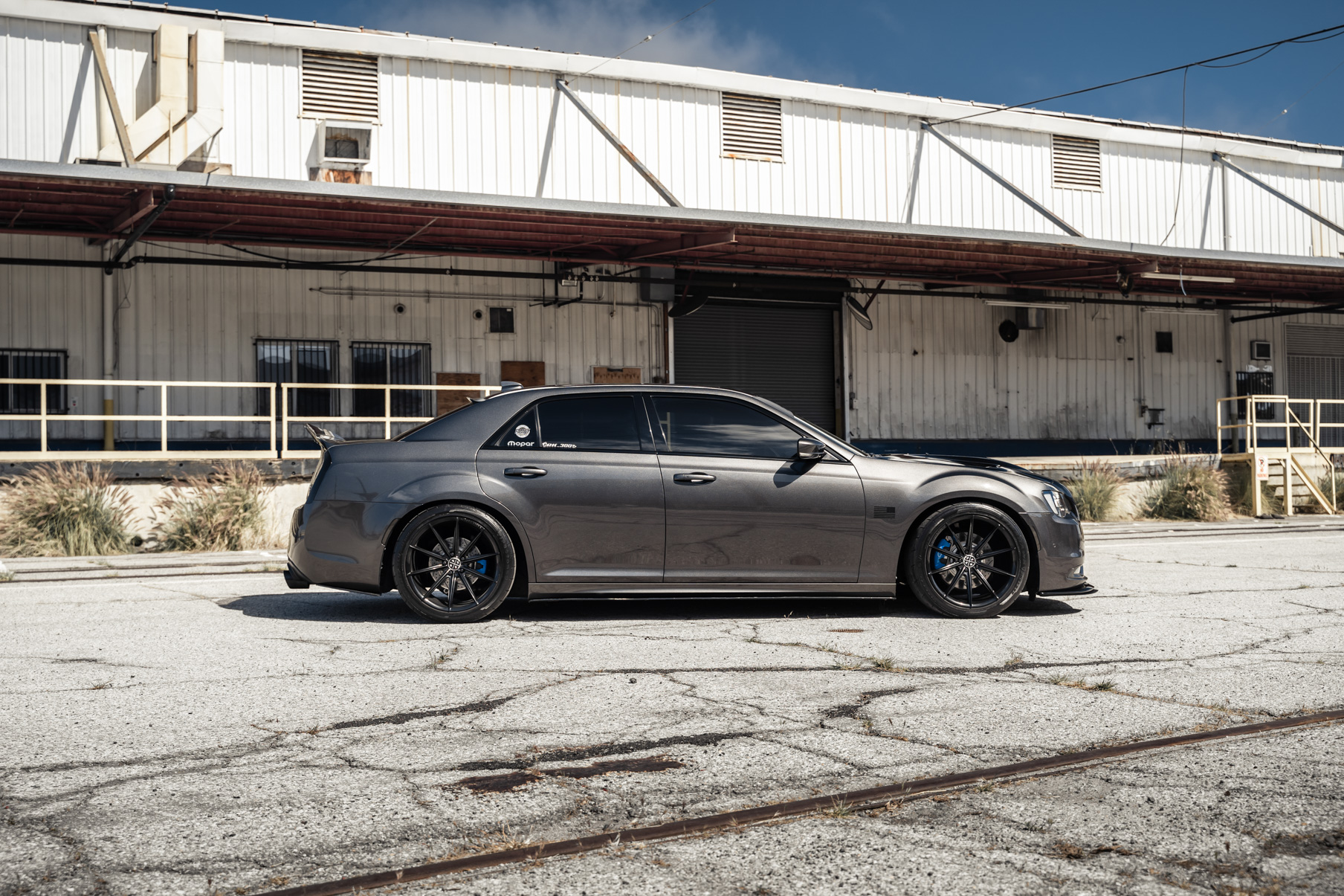 A 2016 Chrysler 300 S on Blaque Diamond BD-11 Gloss Black Wheels