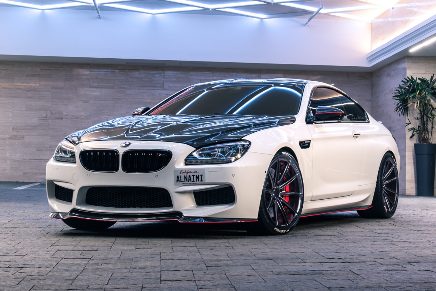 A 2016 BMW M6 on 20 Inch Blaque Diamond BD-11 Gloss Black Wheels