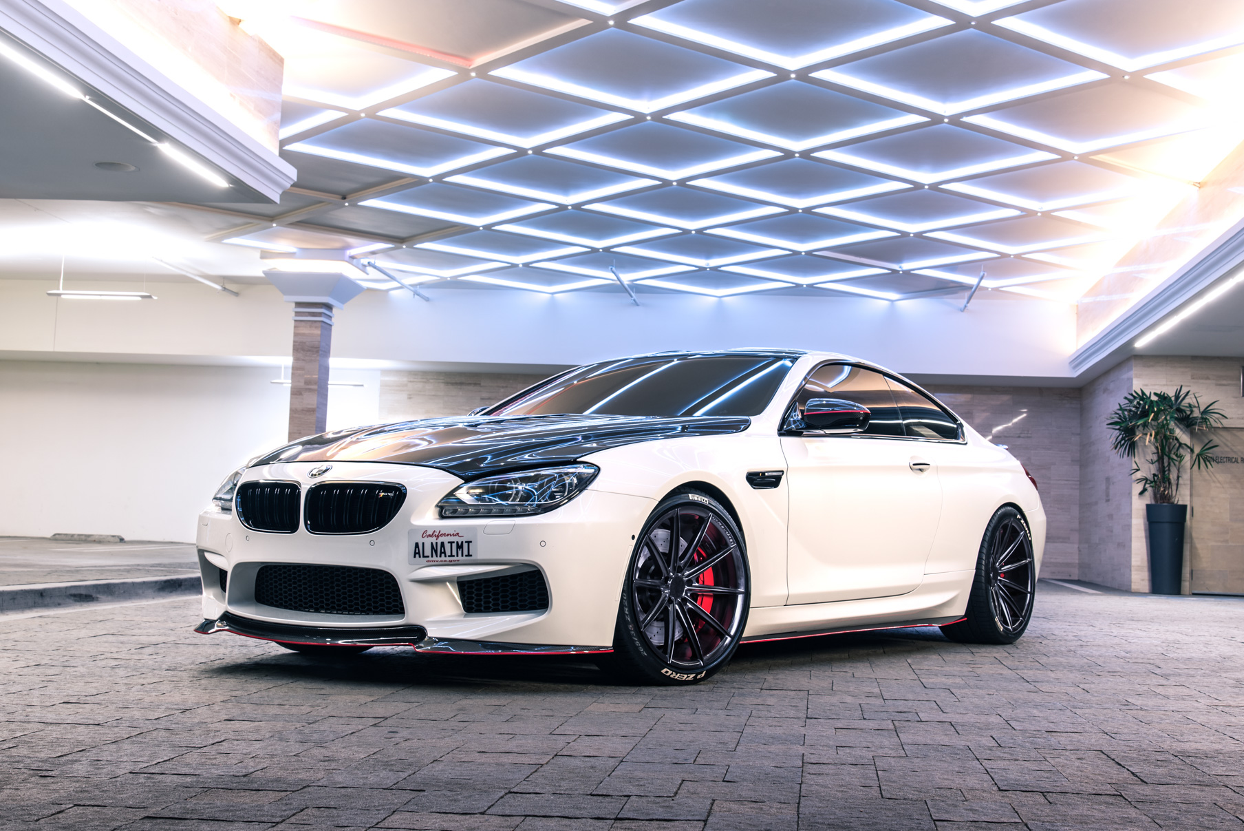 A 2016 BMW M6 on 20 Inch Blaque Diamond BD-11 Gloss Black Wheels