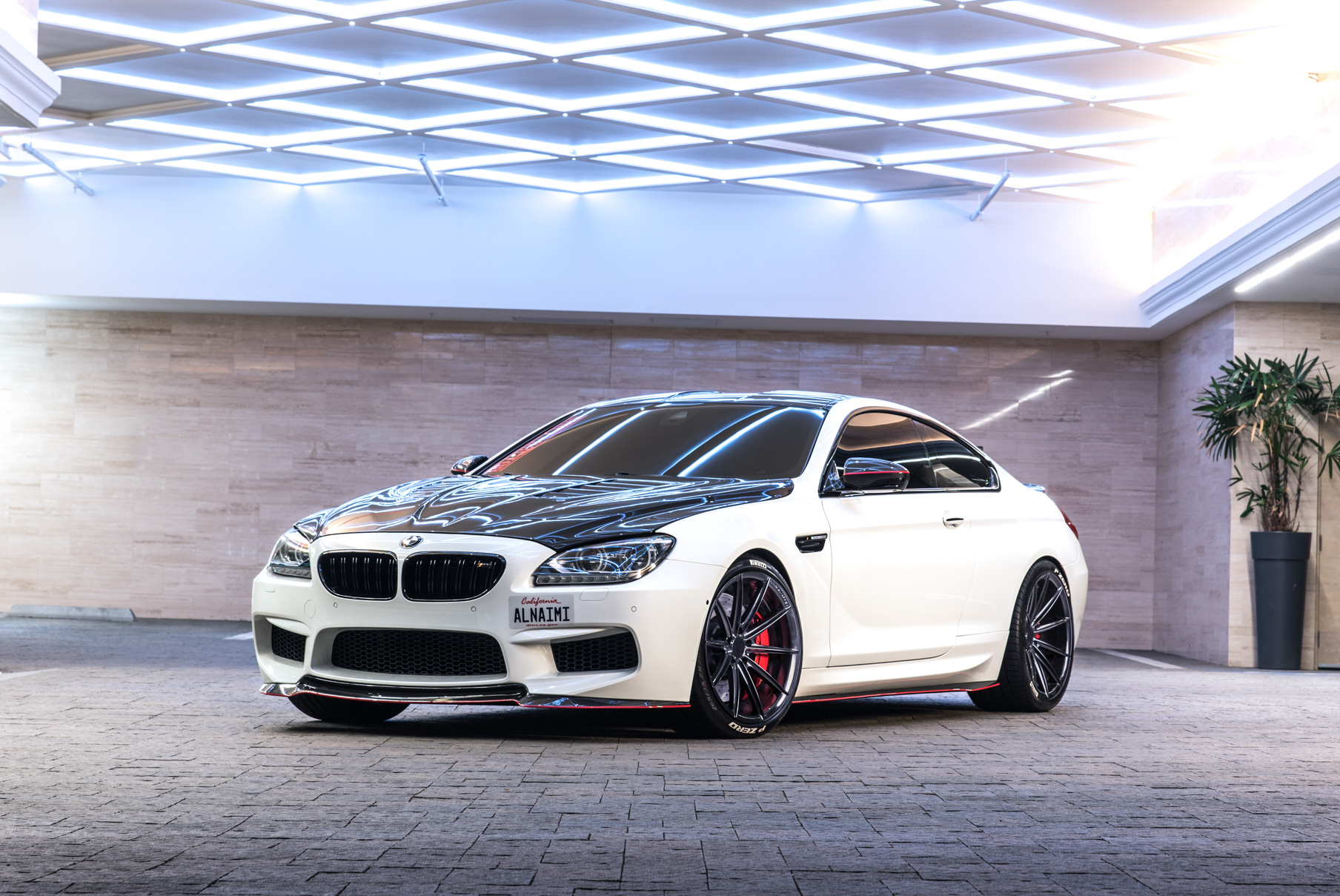 A 2016 BMW M6 on 20 Inch Blaque Diamond BD-11 Gloss Black Wheels