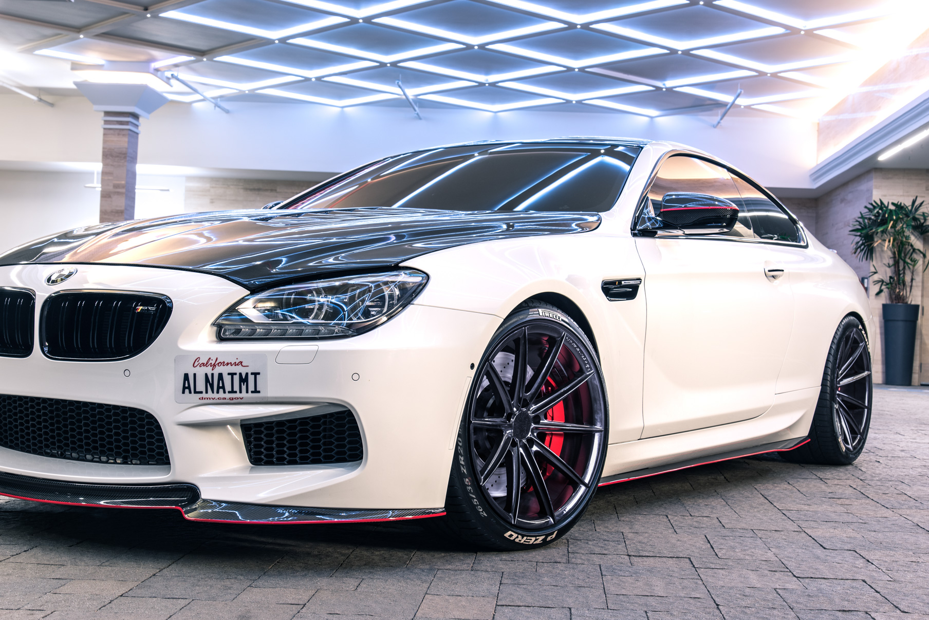 A 2016 BMW M6 on 20 Inch Blaque Diamond BD-11 Gloss Black Wheels