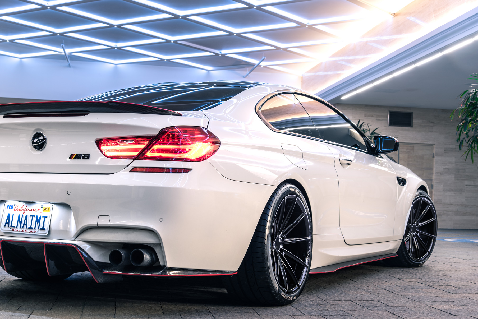 A 2016 BMW M6 on 20 Inch Blaque Diamond BD-11 Gloss Black Wheels