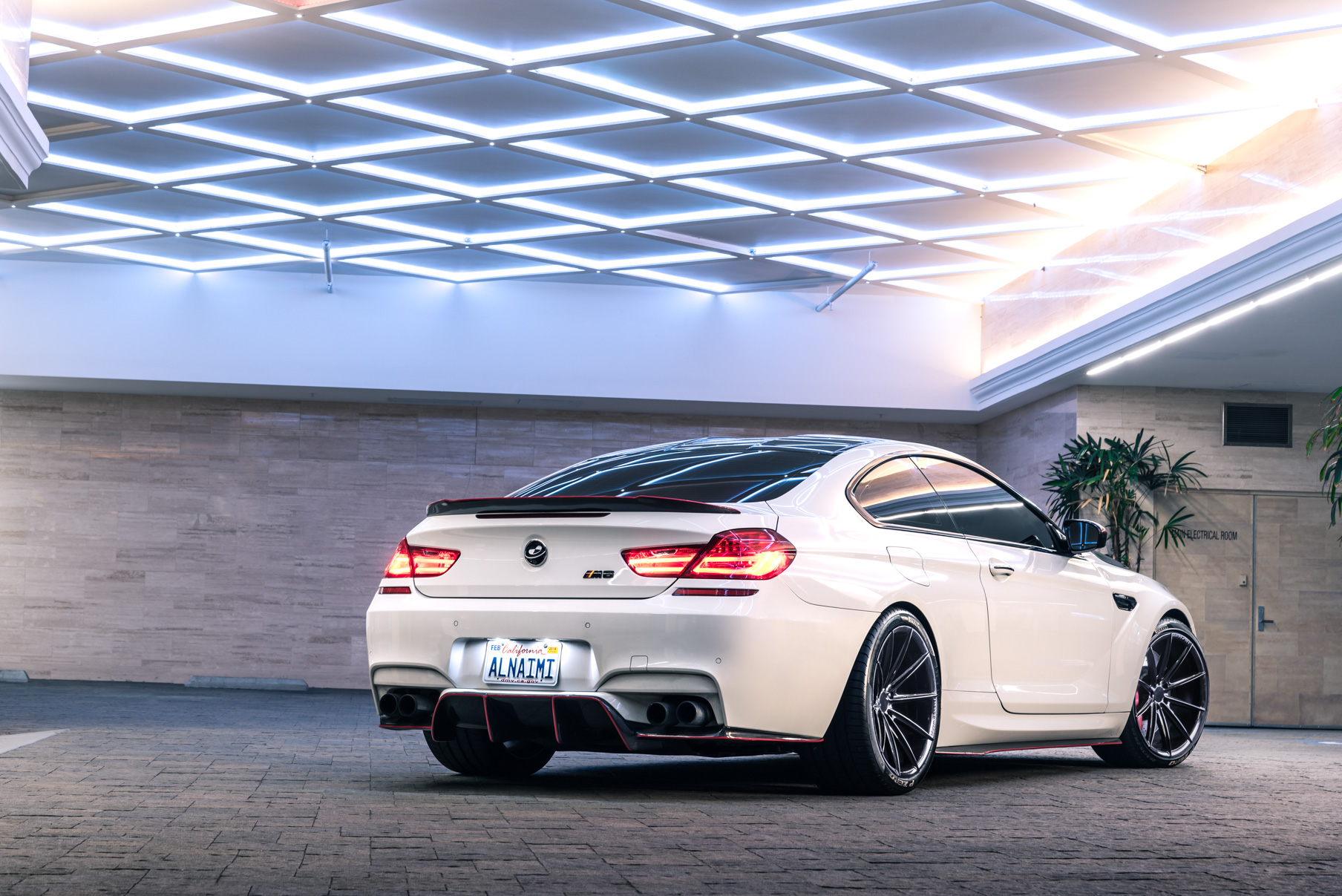 A 2016 BMW M6 on 20 Inch Blaque Diamond BD-11 Gloss Black Wheels