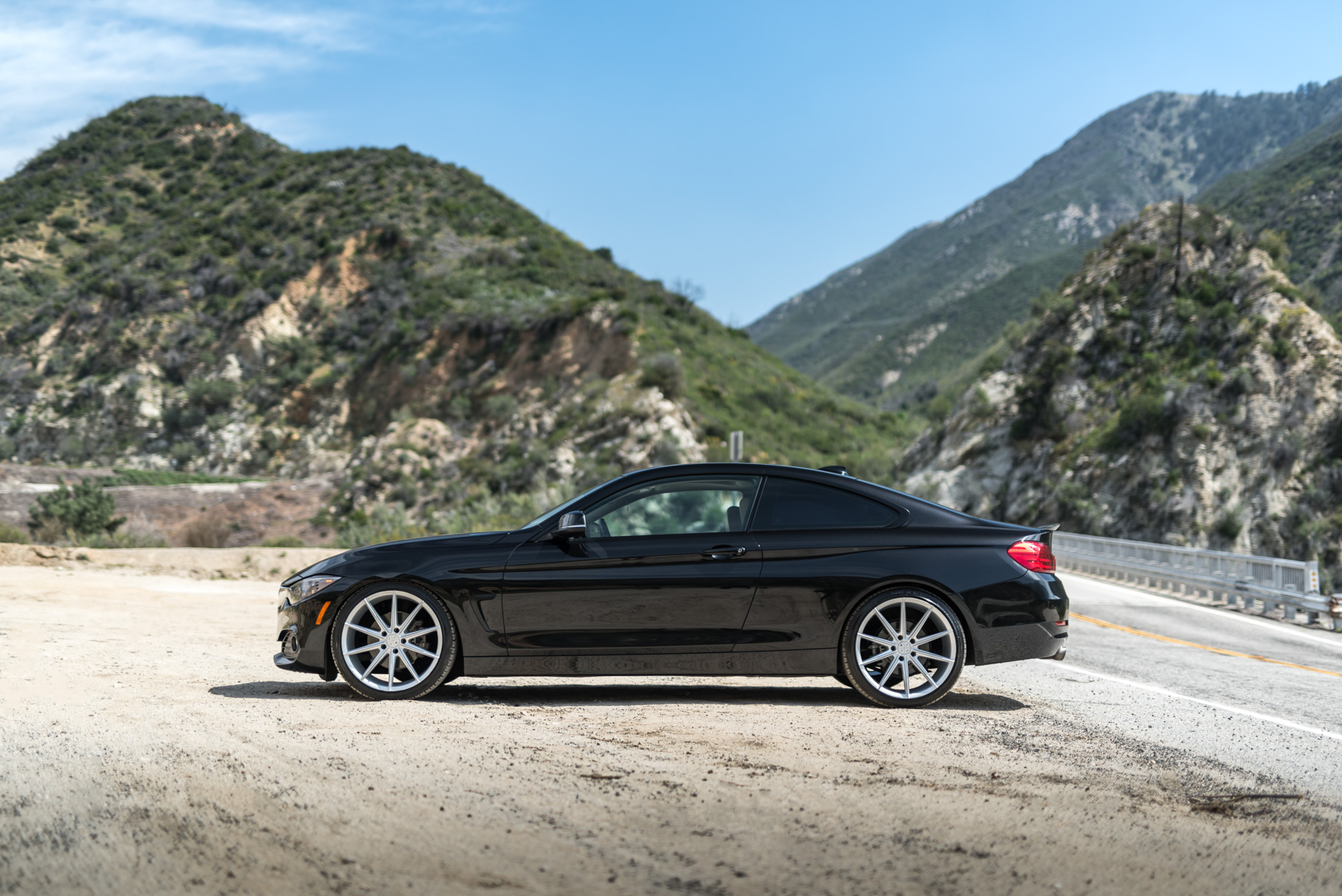 A 2014 BMW 428i on 20 Inch Staggered Blaque Diamond BD-11 Frozen Silver Wheels