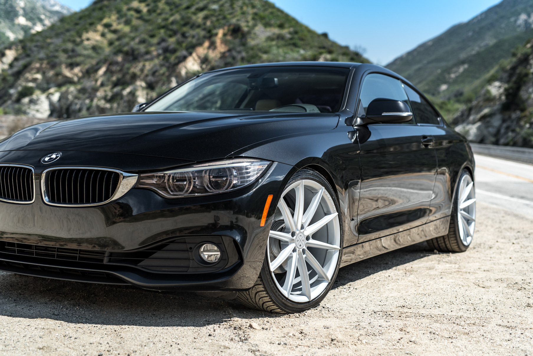 A 2014 BMW 428i on 20 Inch Staggered Blaque Diamond BD-11 Frozen Silver Wheels