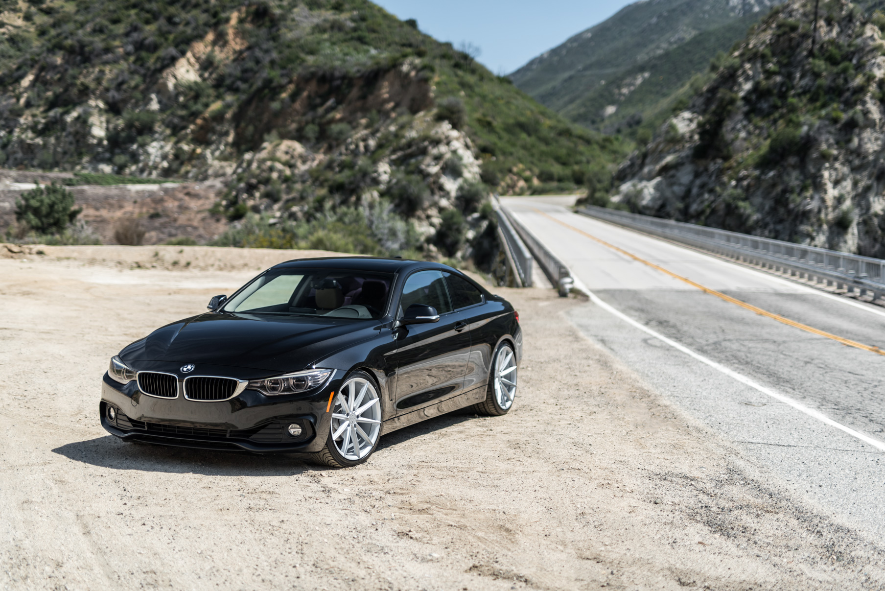 A 2014 BMW 428i on 20 Inch Staggered Blaque Diamond BD-11 Frozen Silver Wheels