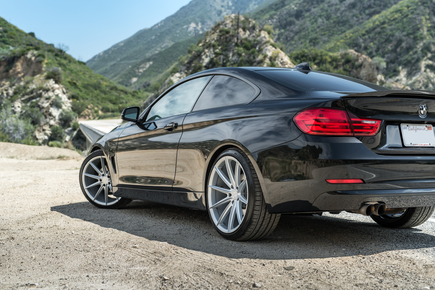 A 2014 BMW 428i on 20 Inch Staggered Blaque Diamond BD-11 Frozen Silver Wheels