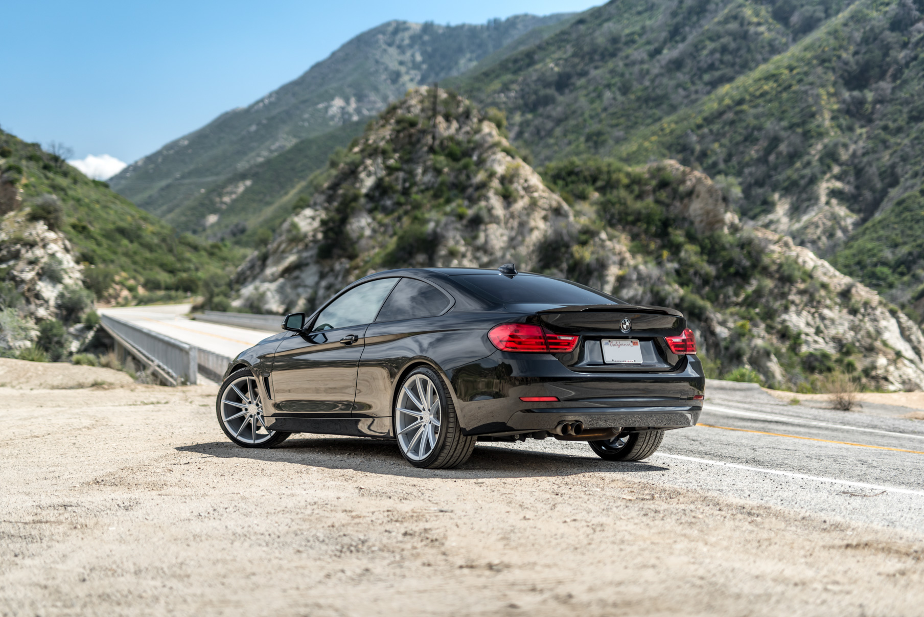 A 2014 BMW 428i on 20 Inch Staggered Blaque Diamond BD-11 Frozen Silver Wheels