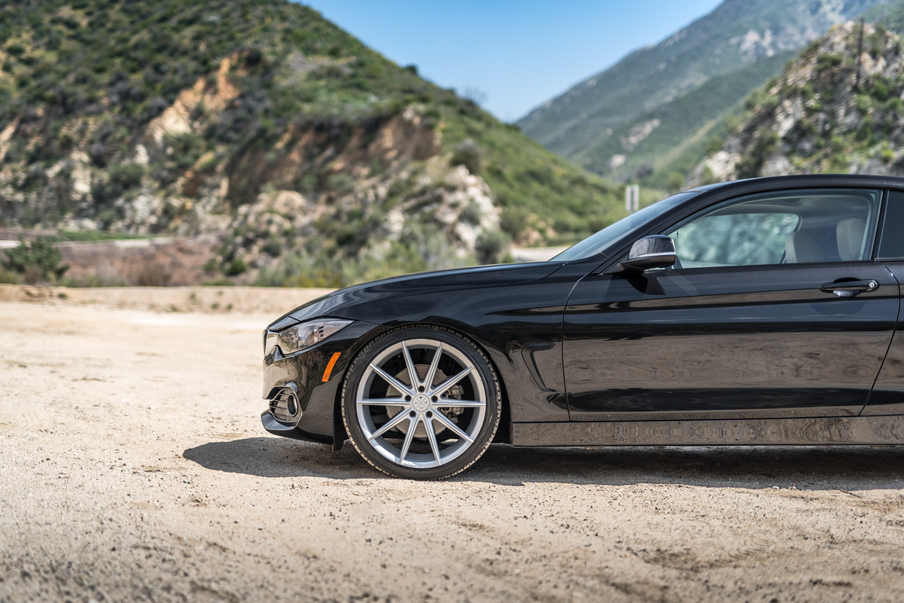 A 2014 BMW 428i on 20 Inch Staggered Blaque Diamond BD-11 Frozen Silver Wheels