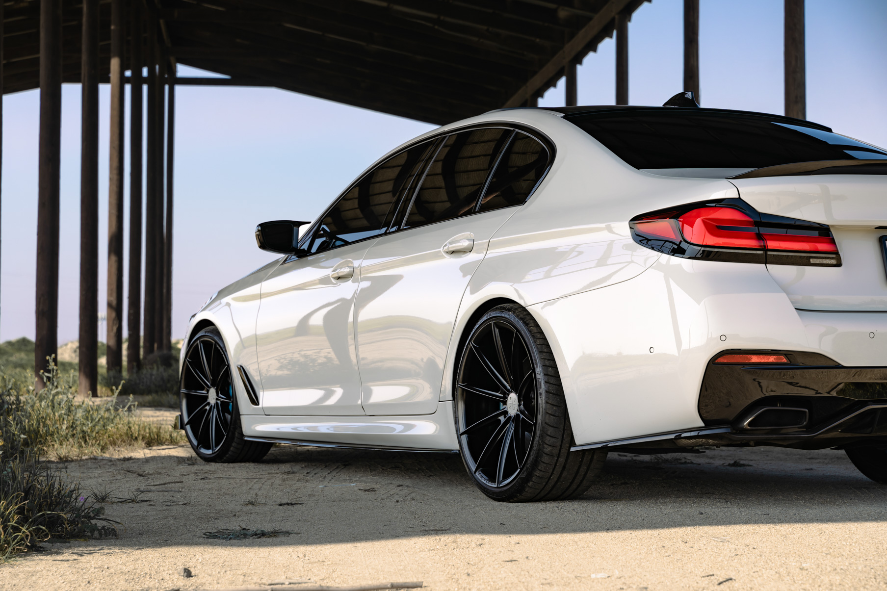 A 2021 BMW 540i on 20 Inch Blaque Diamond BD-11 Gloss Black Wheels