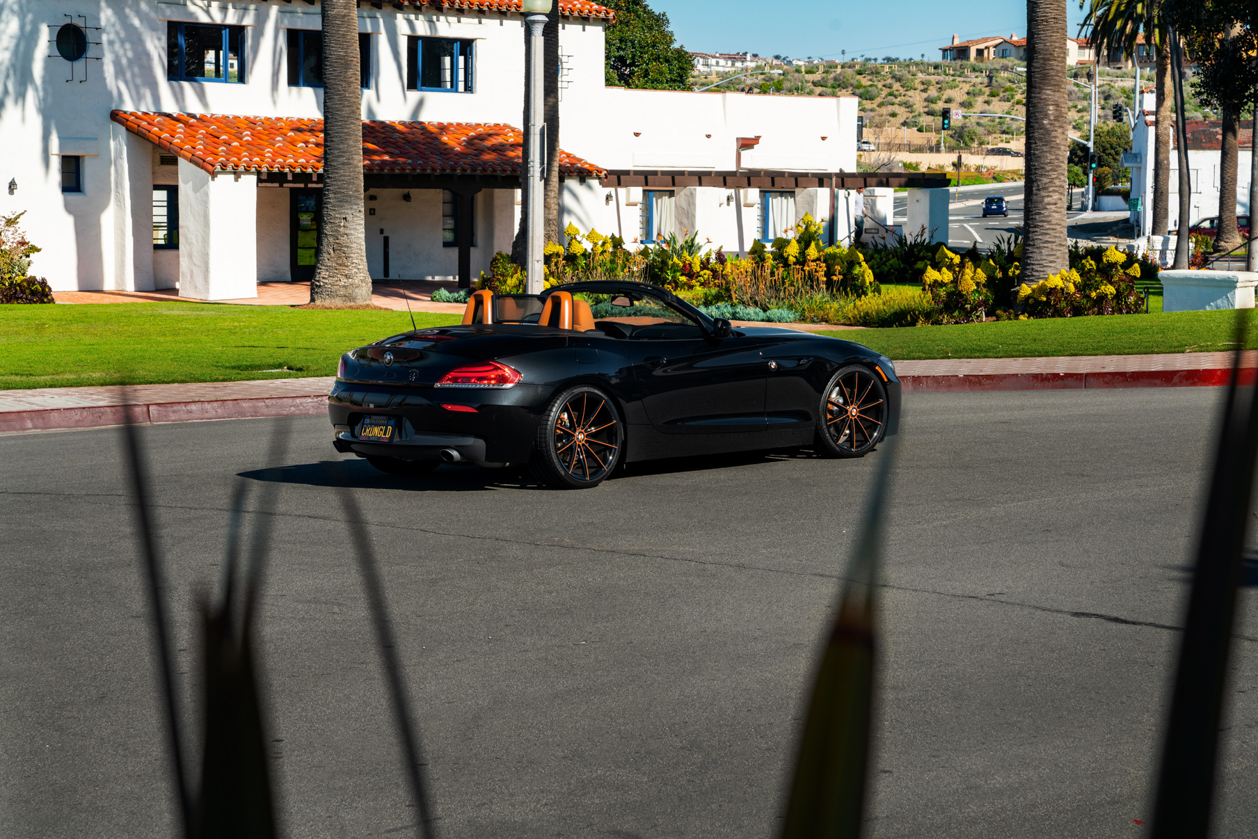 A 2018 BMW Z4 on 20 Inch Blaque Diamond BD-11 Orange Black Wheels