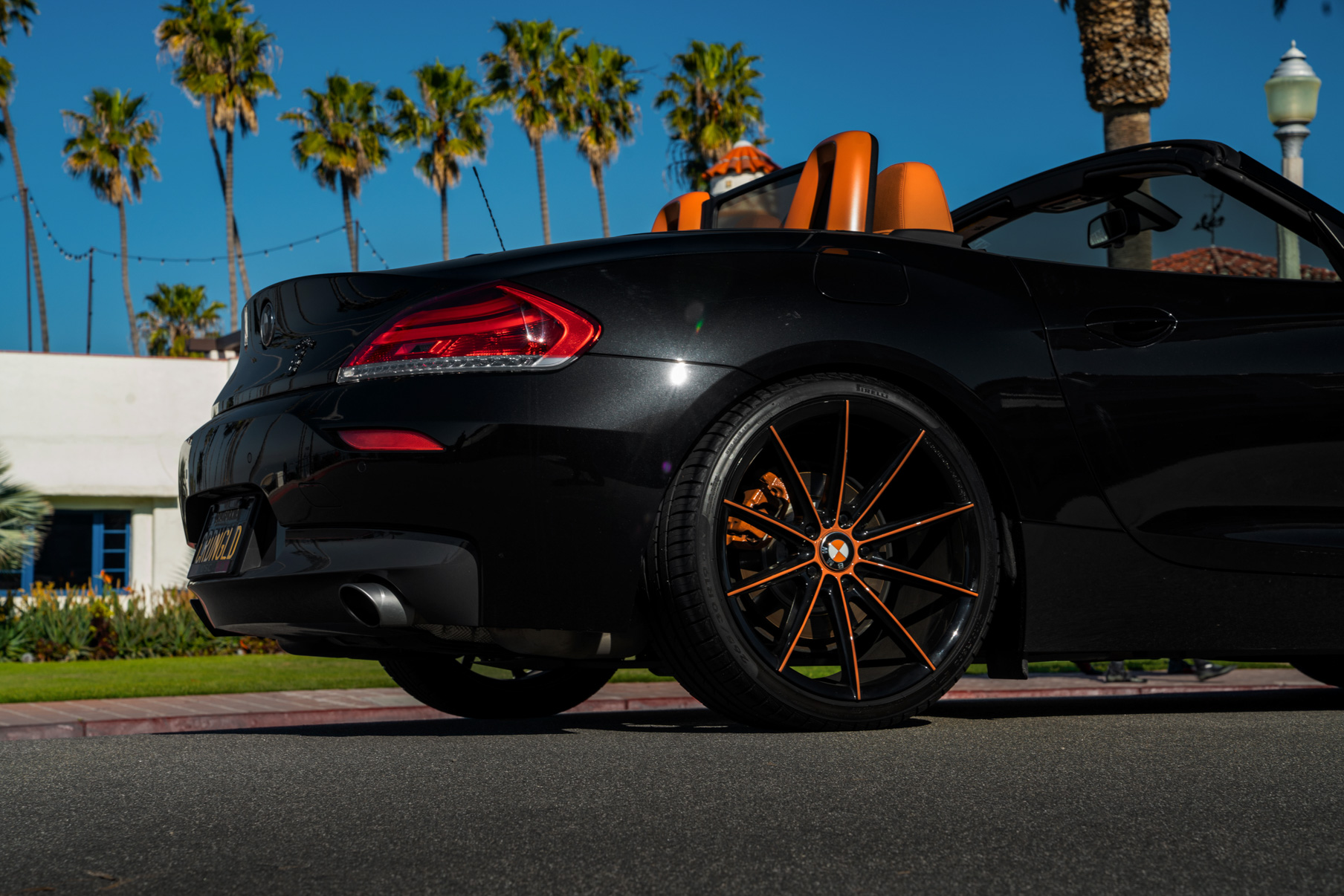 A 2018 BMW Z4 on 20 Inch Blaque Diamond BD-11 Orange Black Wheels