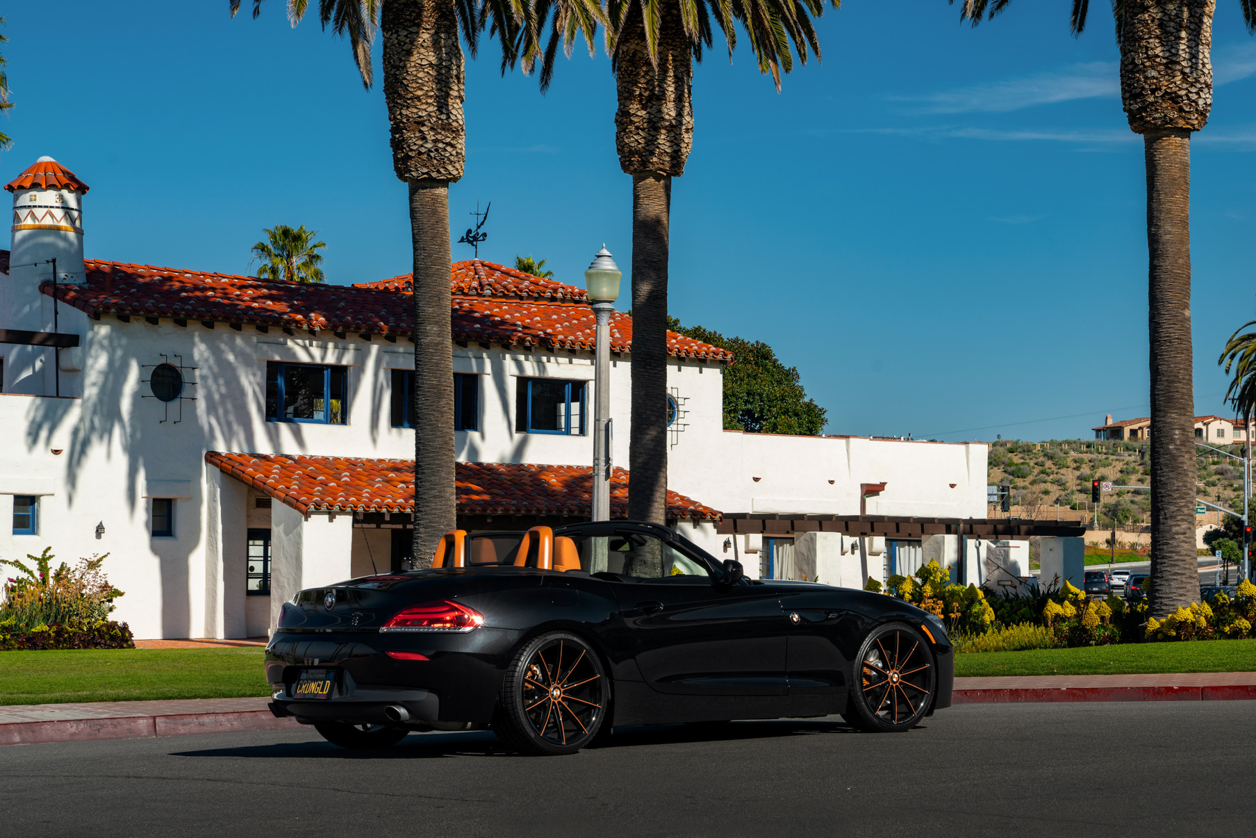 A 2018 BMW Z4 on 20 Inch Blaque Diamond BD-11 Orange Black Wheels