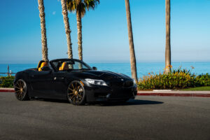 A 2018 BMW Z4 on 20 Inch Blaque Diamond BD-11 Orange Black Wheels