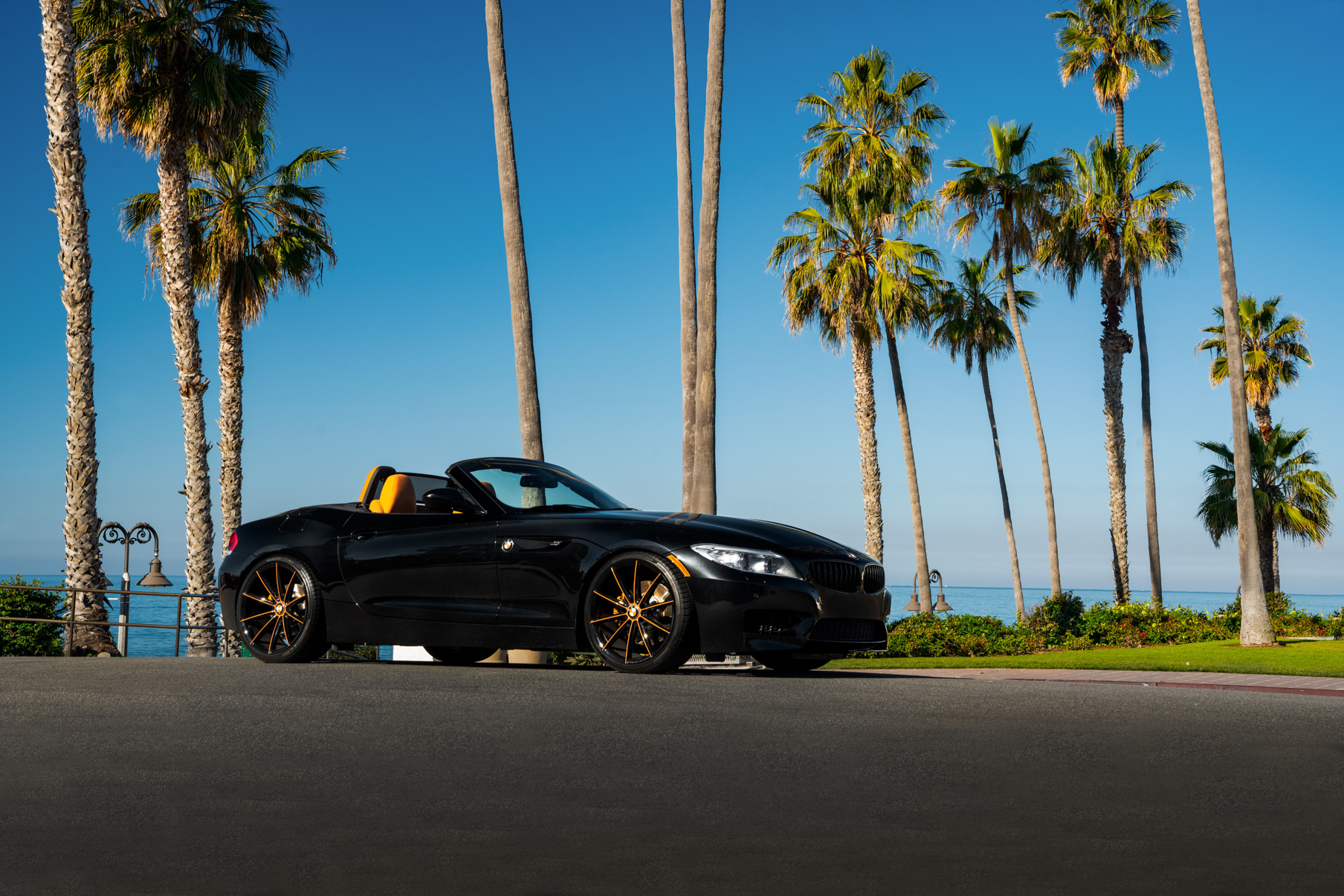 A 2018 BMW Z4 on 20 Inch Blaque Diamond BD-11 Orange Black Wheels