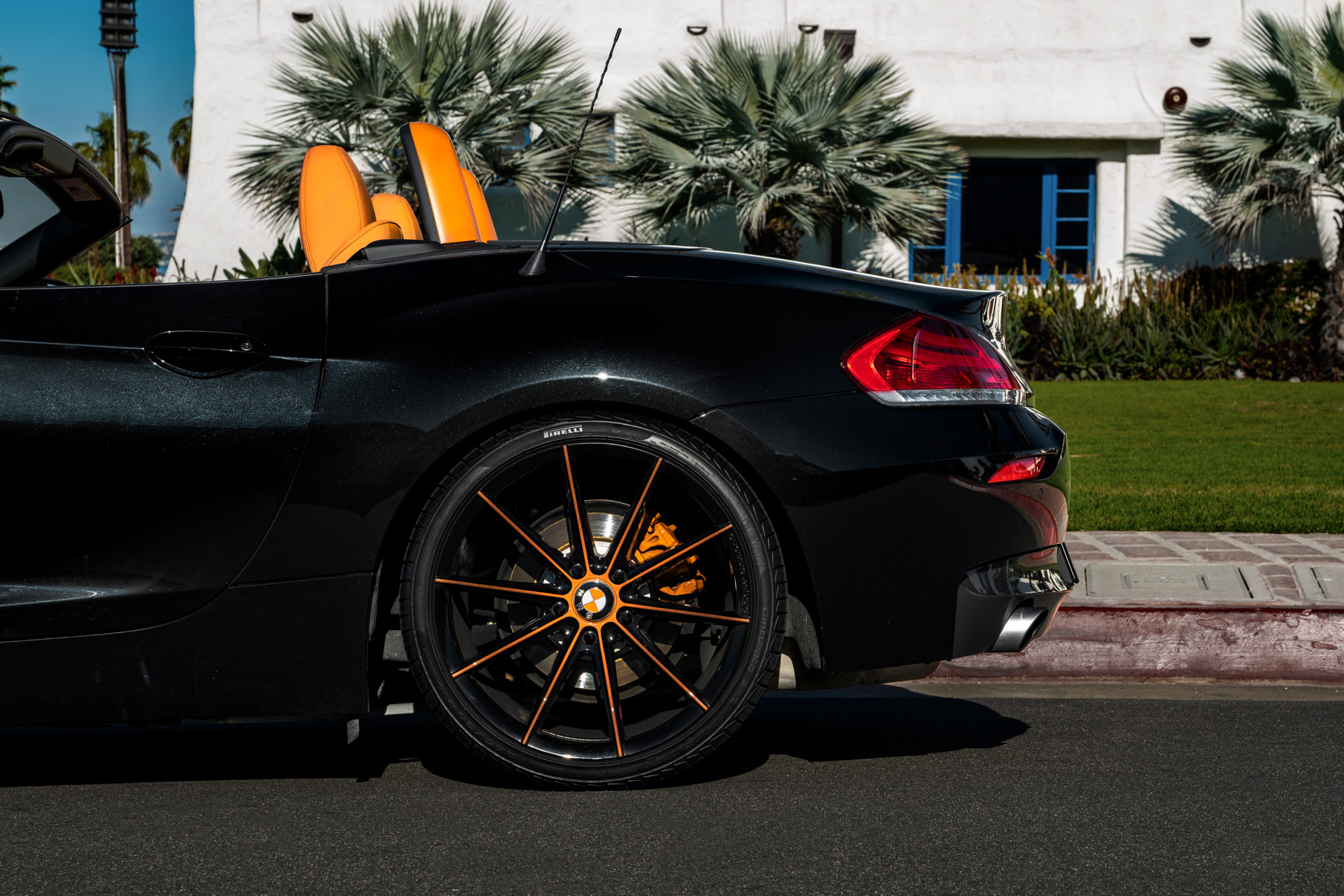 A 2018 BMW Z4 on 20 Inch Blaque Diamond BD-11 Orange Black Wheels