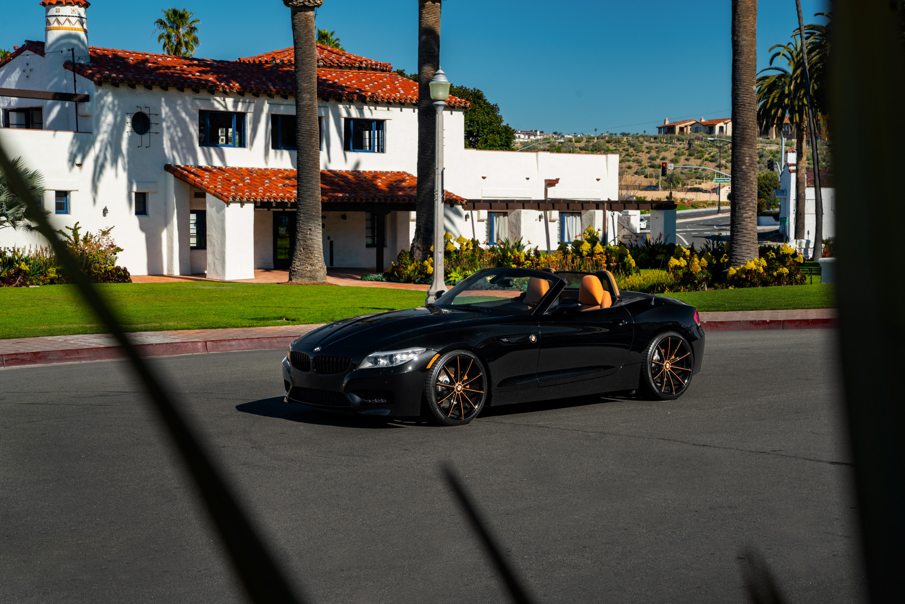 A 2018 BMW Z4 on 20 Inch Blaque Diamond BD-11 Orange Black Wheels