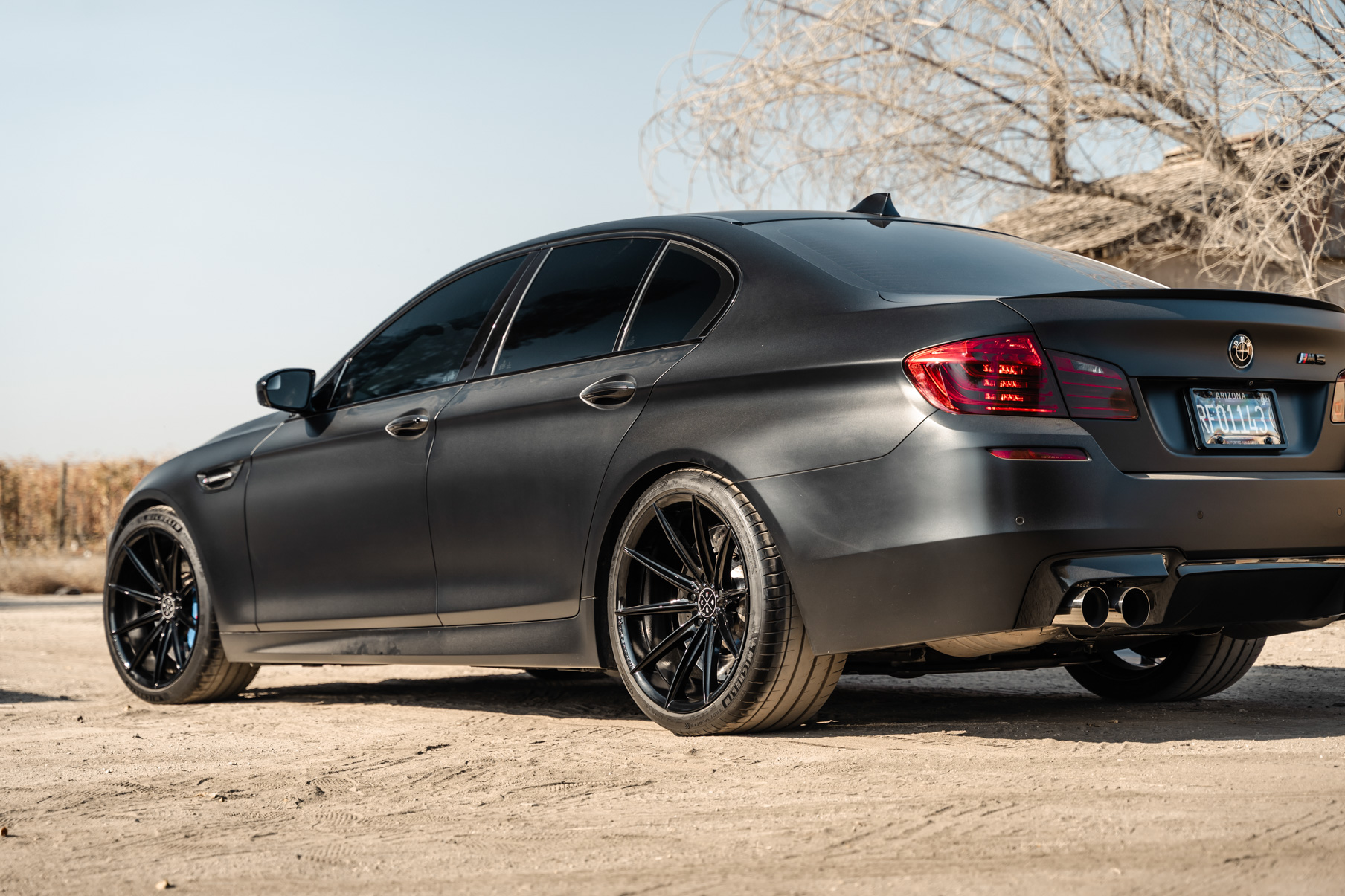 A 2016 BMW M5 on 20 Inch Blaque Diamond BD-11 Gloss Black Wheels