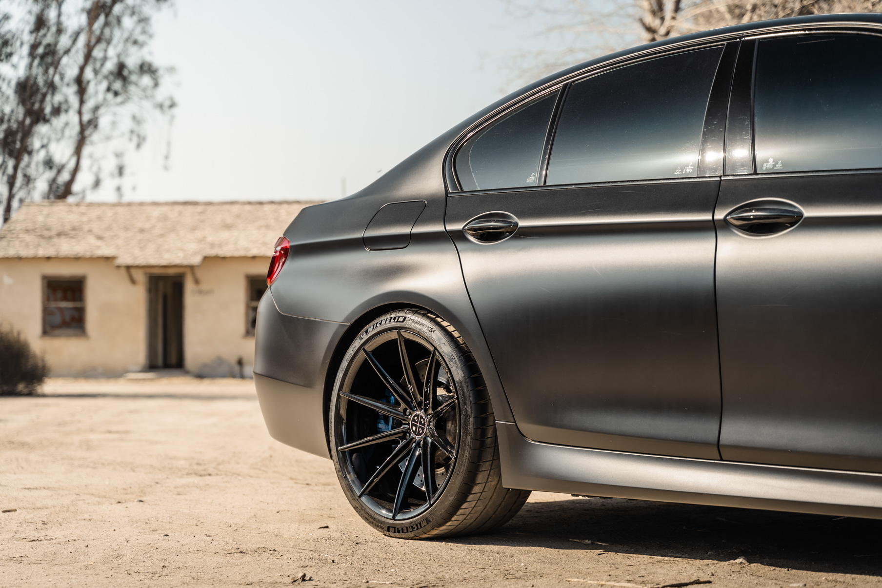A 2016 BMW M5 on 20 Inch Blaque Diamond BD-11 Gloss Black Wheels
