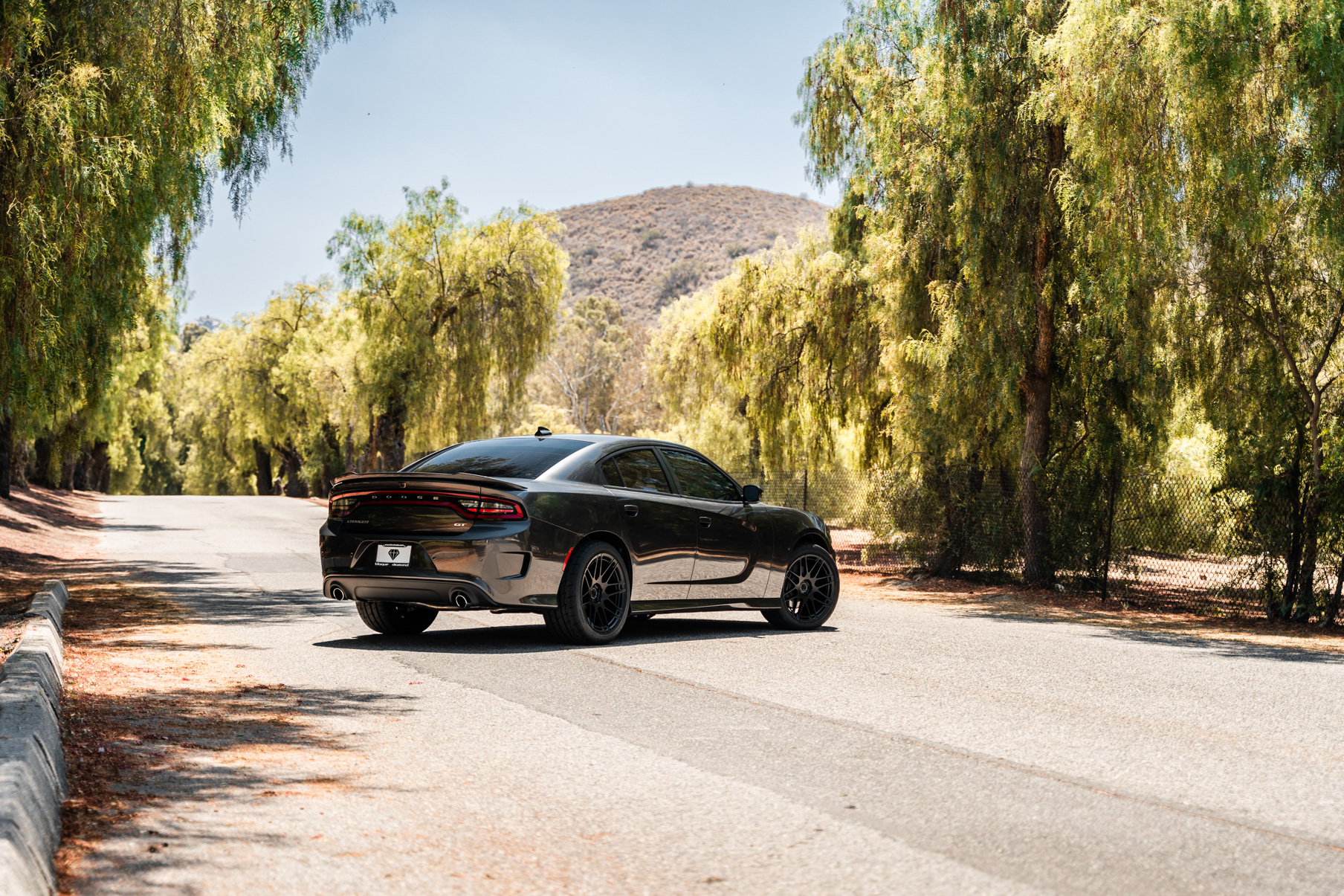 A 2019 Dodge Charger GT on 20 Inch Blaque Diamond BD-F12 Satin Black Wheels