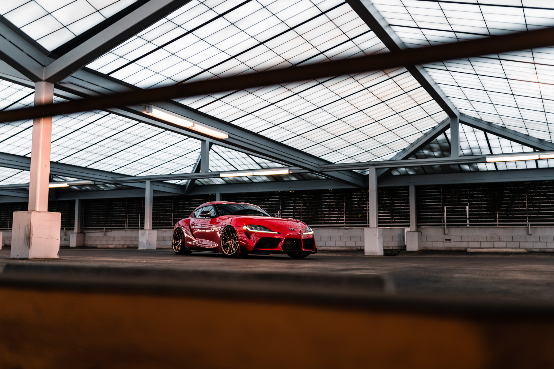 A 2020 Toyota Supra on Blaque Diamond BD-F18 Polished Bronze Little Tokyo Wheels