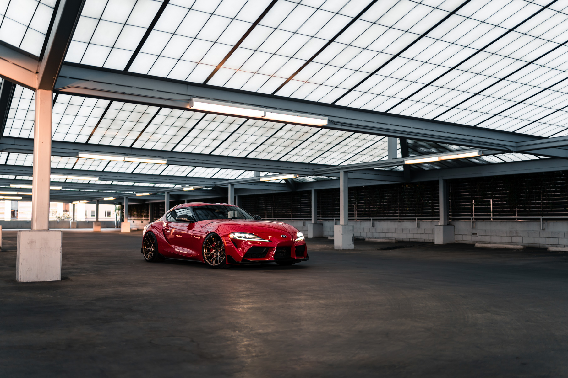 A 2020 Toyota Supra on Blaque Diamond BD-F18 Polished Bronze Little Tokyo Wheels