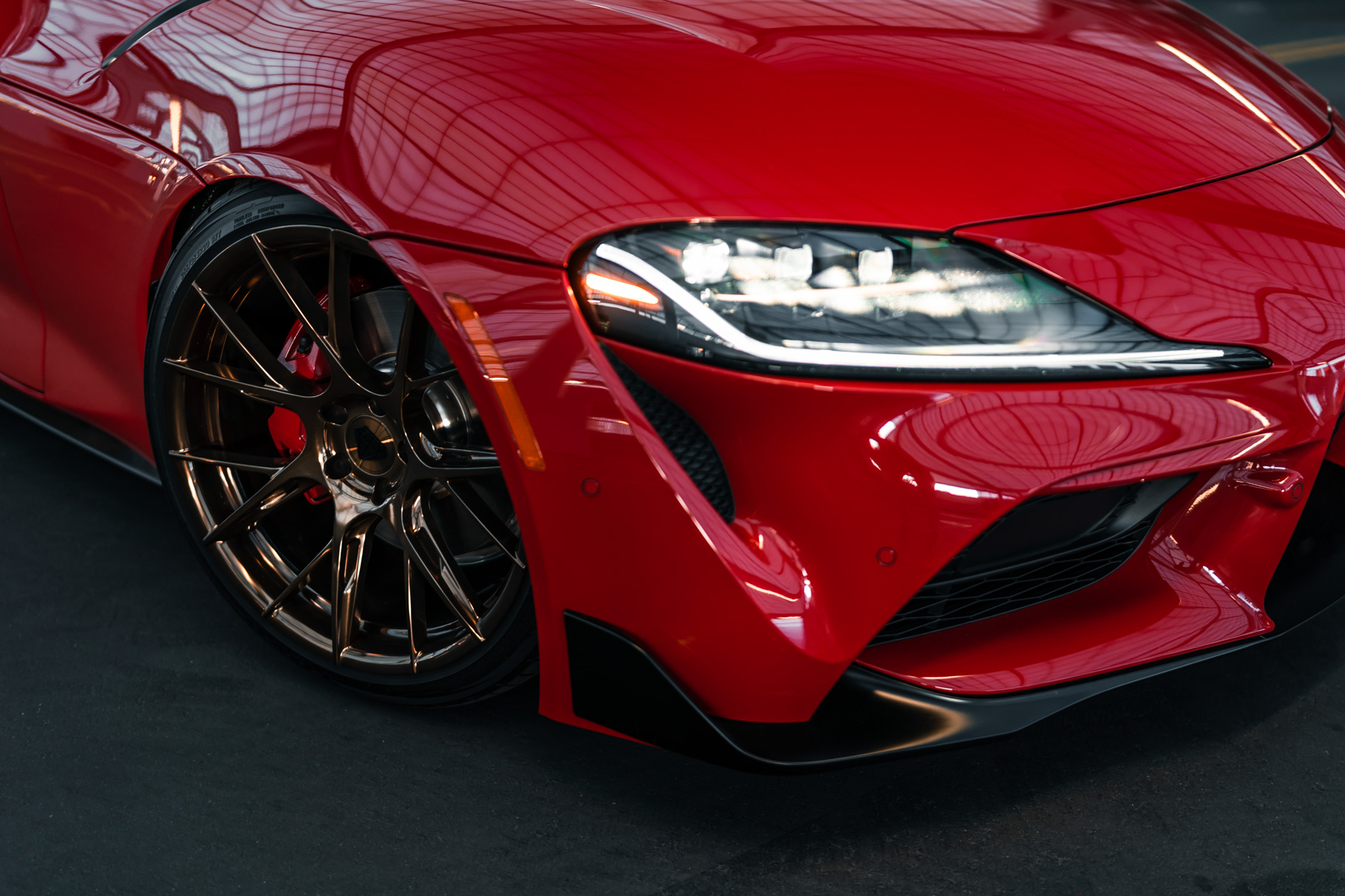 A 2020 Toyota Supra on Blaque Diamond BD-F18 Polished Bronze Little Tokyo Wheels