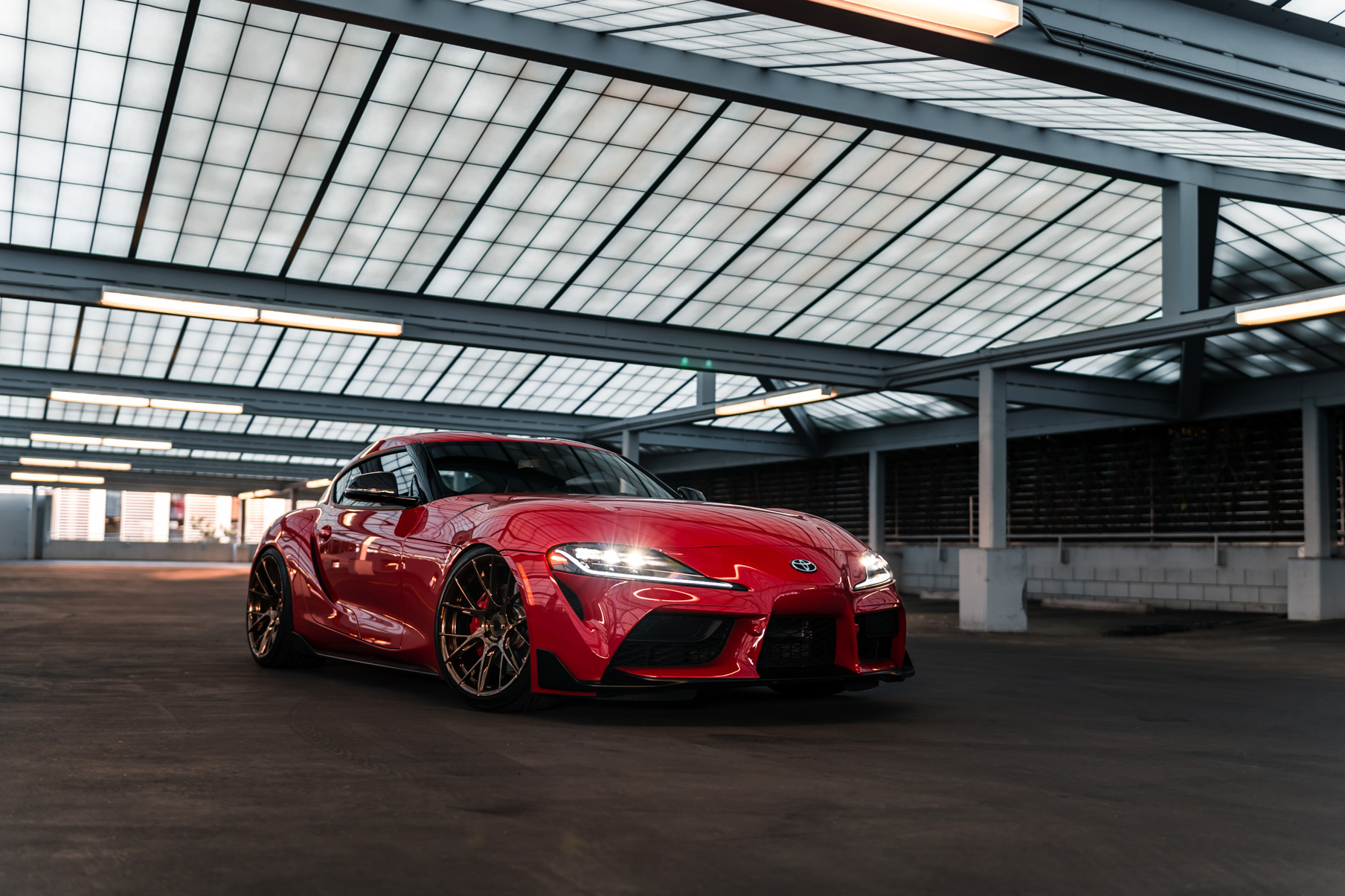 A 2020 Toyota Supra on Blaque Diamond BD-F18 Polished Bronze Little Tokyo Wheels
