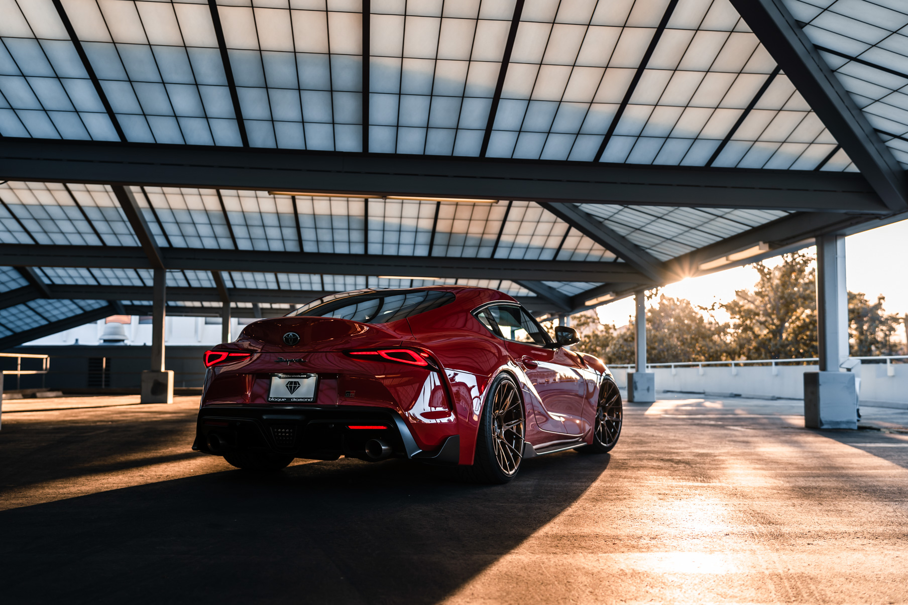 A 2020 Toyota Supra on Blaque Diamond BD-F18 Polished Bronze Little Tokyo Wheels