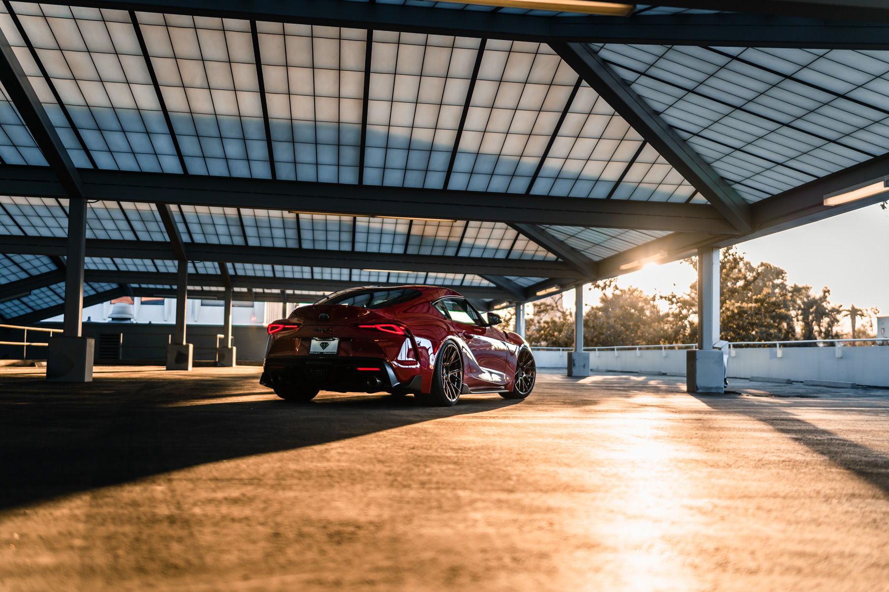 A 2020 Toyota Supra on Blaque Diamond BD-F18 Polished Bronze Little Tokyo Wheels