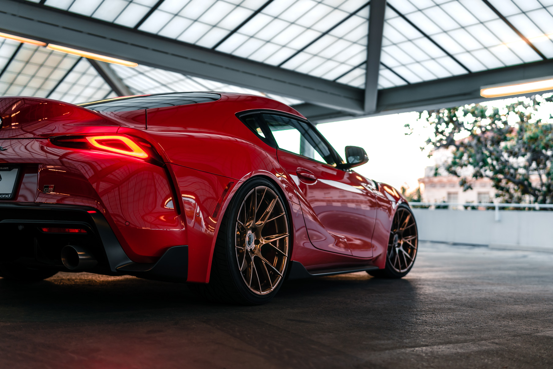 A 2020 Toyota Supra on Blaque Diamond BD-F18 Polished Bronze Little Tokyo Wheels