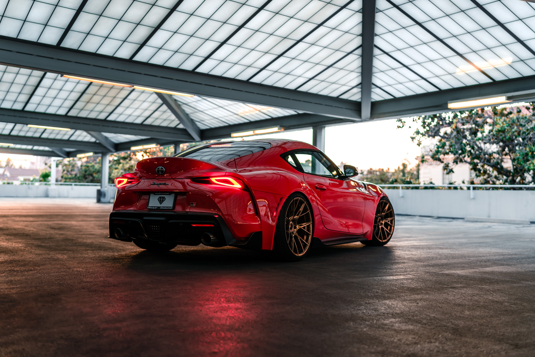 A 2020 Toyota Supra on Blaque Diamond BD-F18 Polished Bronze Little Tokyo Wheels